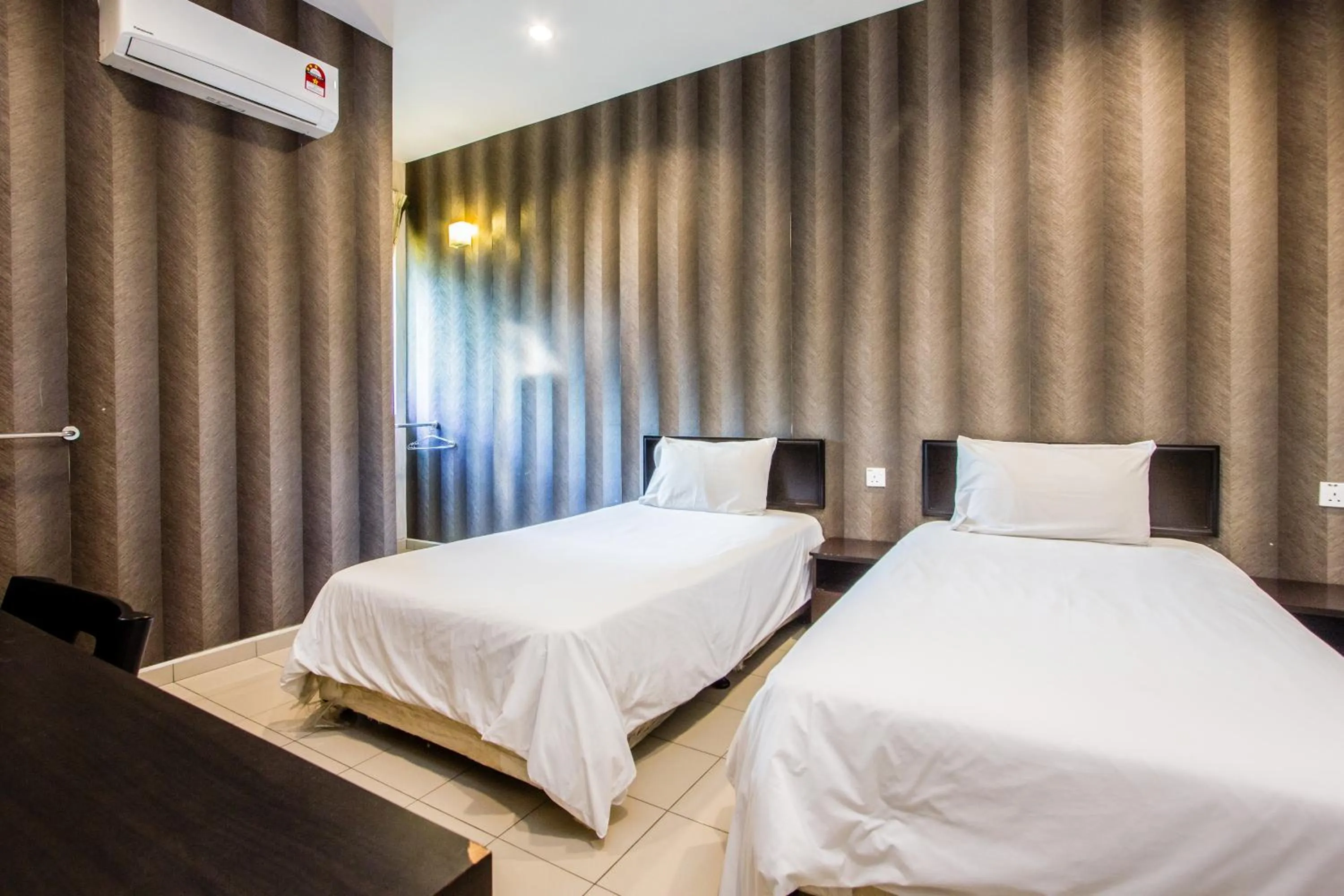 Bed in Value Inn Homestay