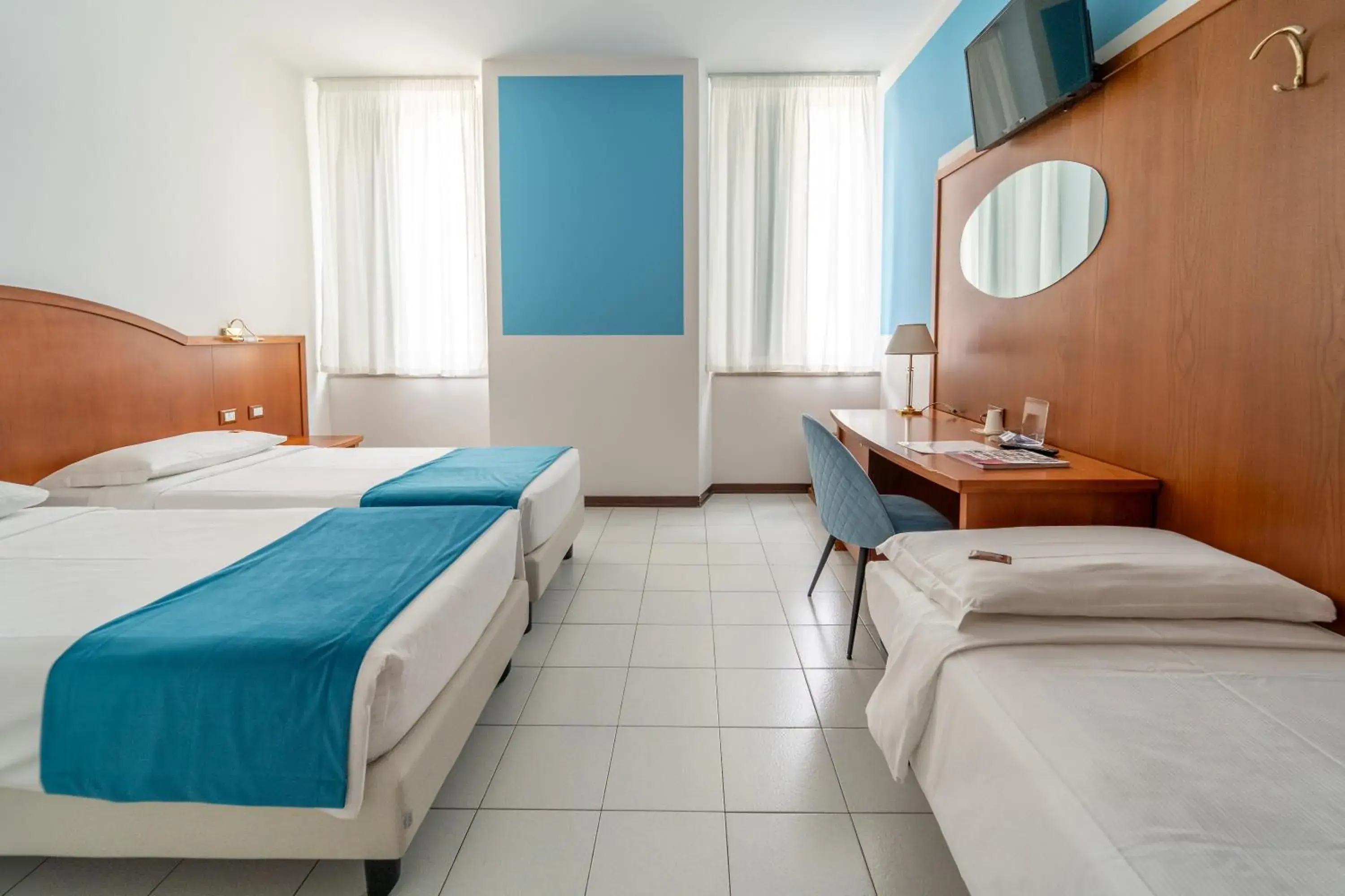 Quadruple Room in Hotel Italia Quadruple Room in Hotel Italia