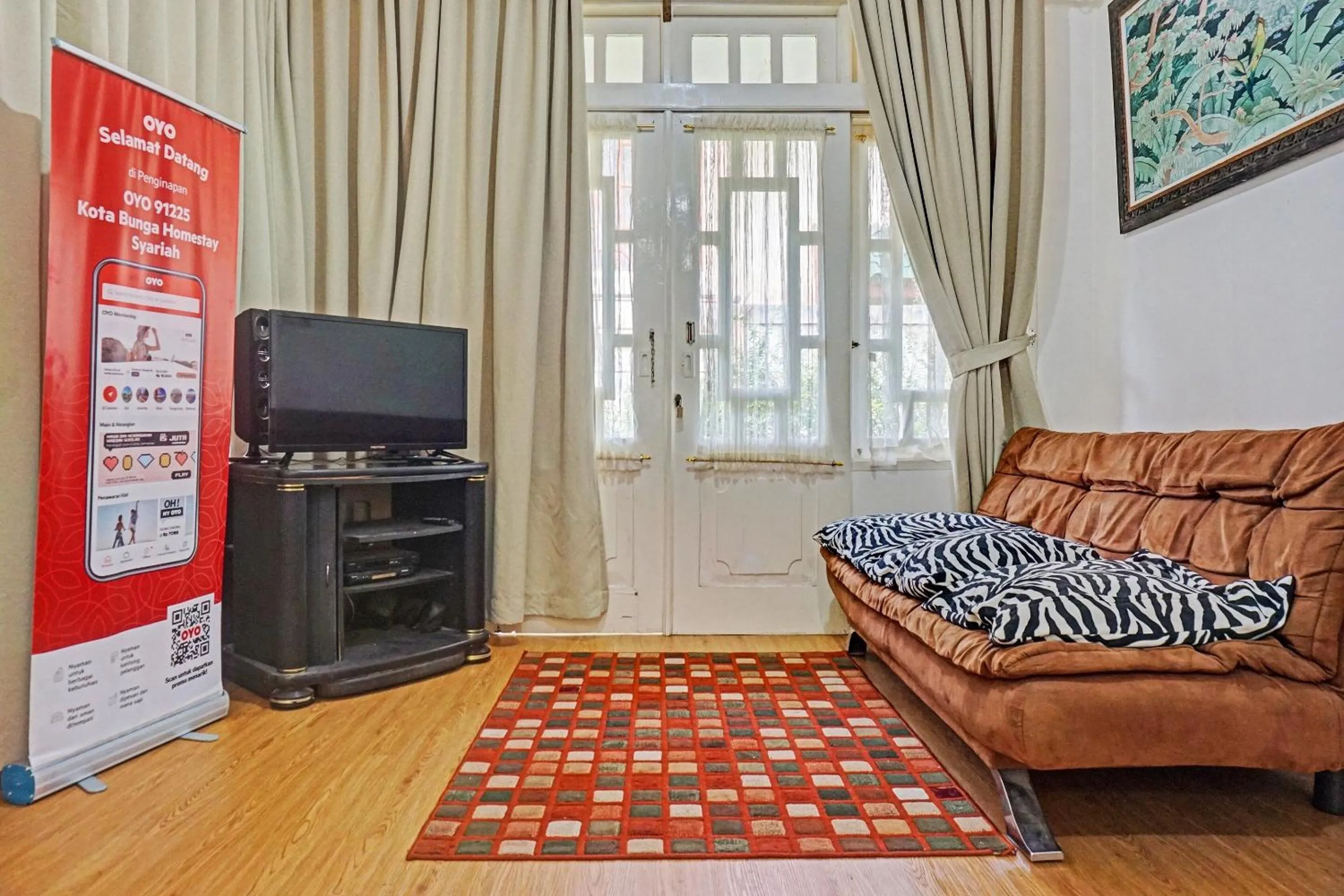 Lobby or reception in SPOT ON 91225 Kota Bunga Homestay Syariah