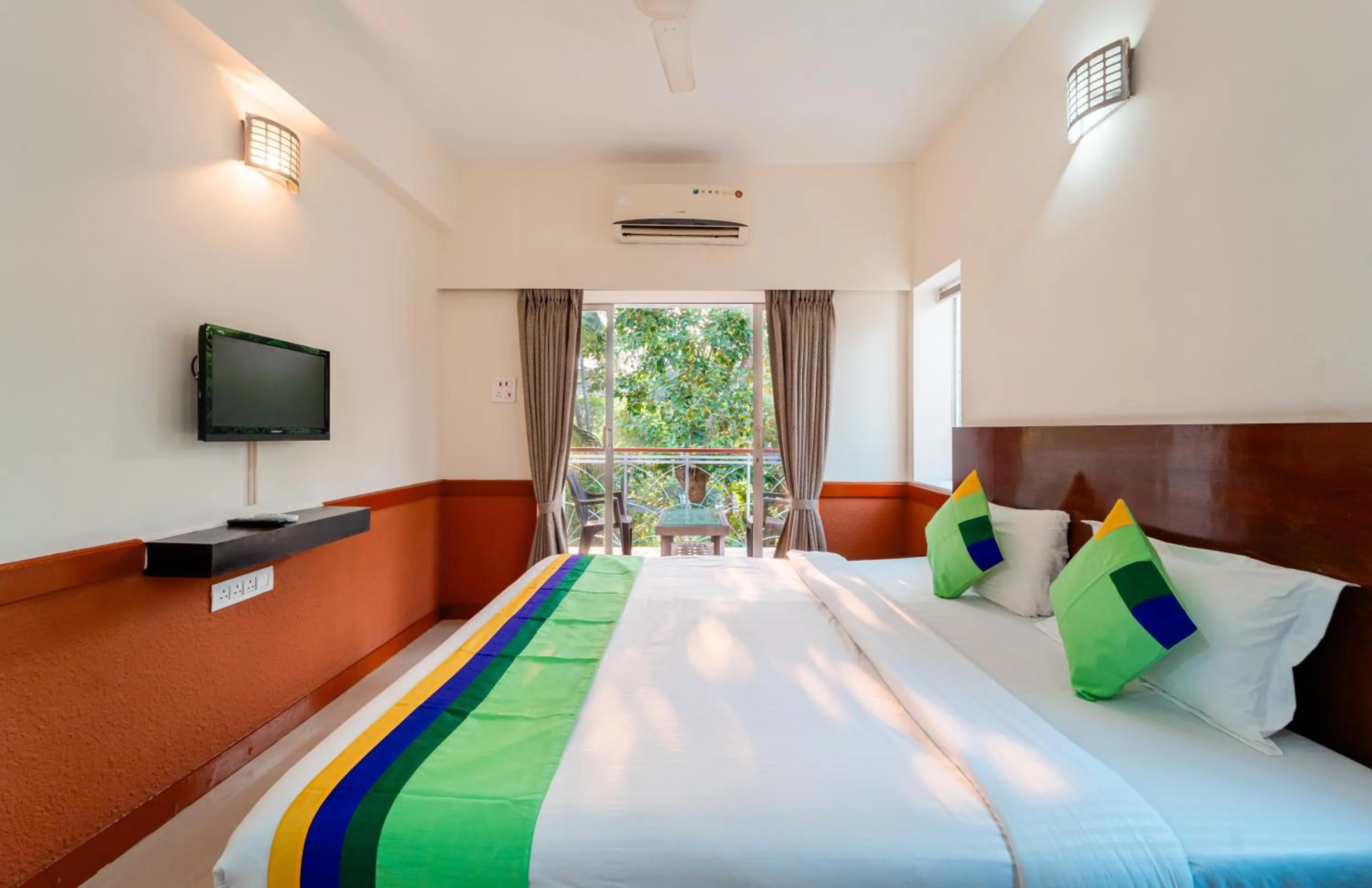 Bedroom, Bed in Treebo Gulmohar Beach Resort with Pool
