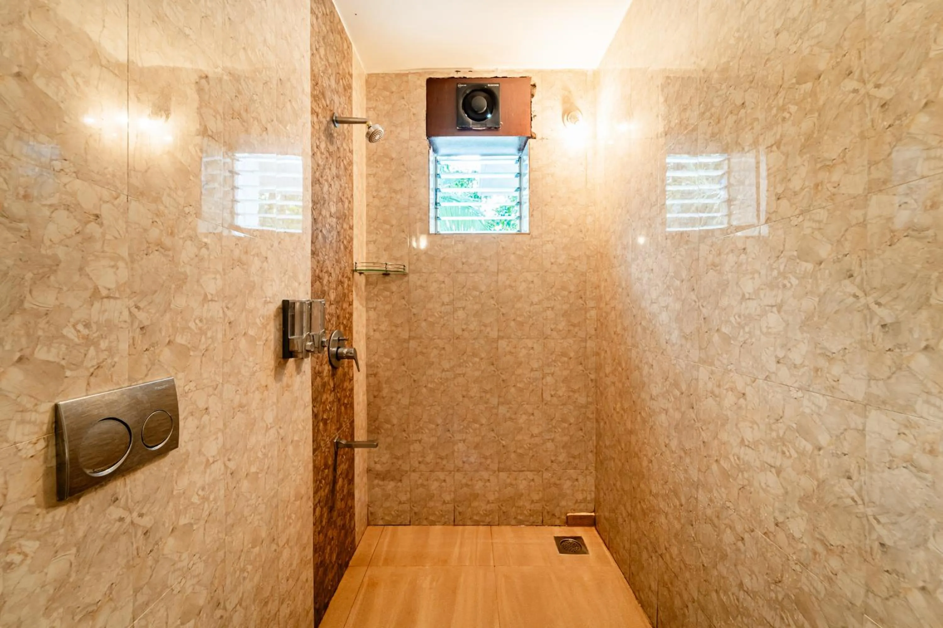 Bathroom in Treebo Gulmohar Beach Resort with Pool