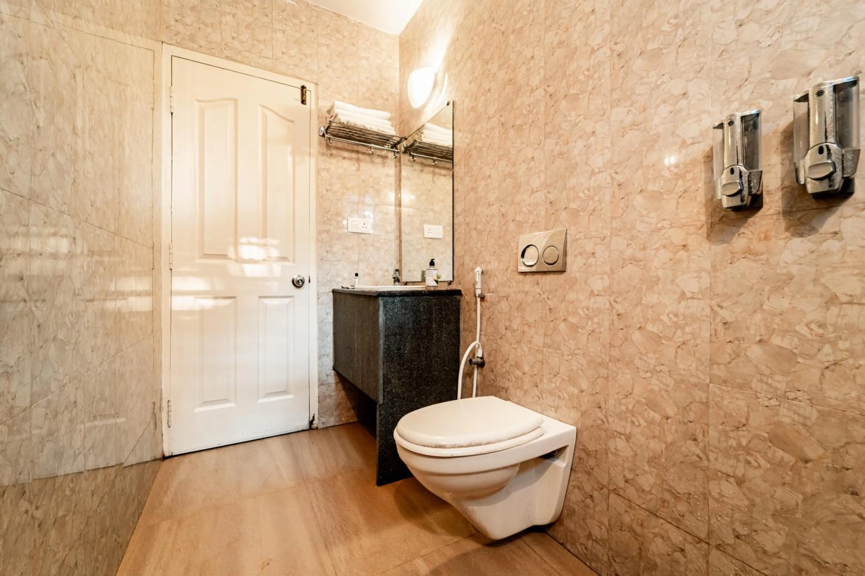 Bathroom in Treebo Gulmohar Beach Resort with Pool