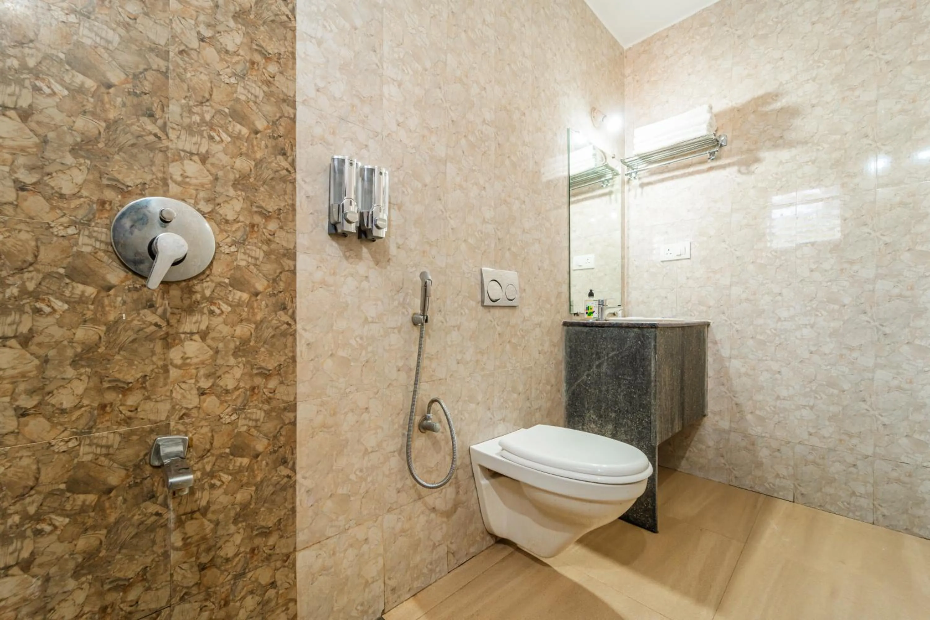 Bathroom in Treebo Gulmohar Beach Resort with Pool