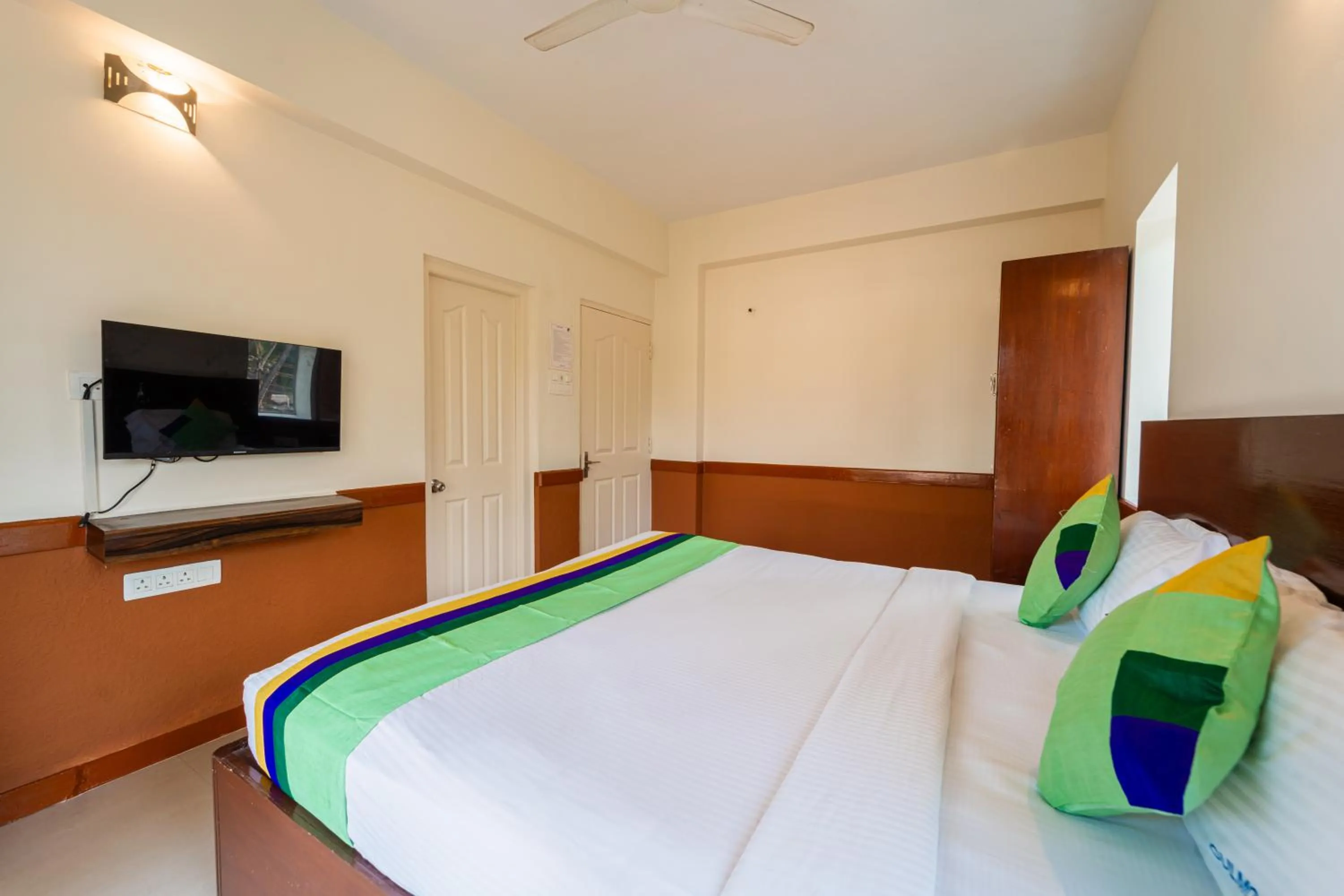 Bedroom, Bed in Treebo Gulmohar Beach Resort with Pool