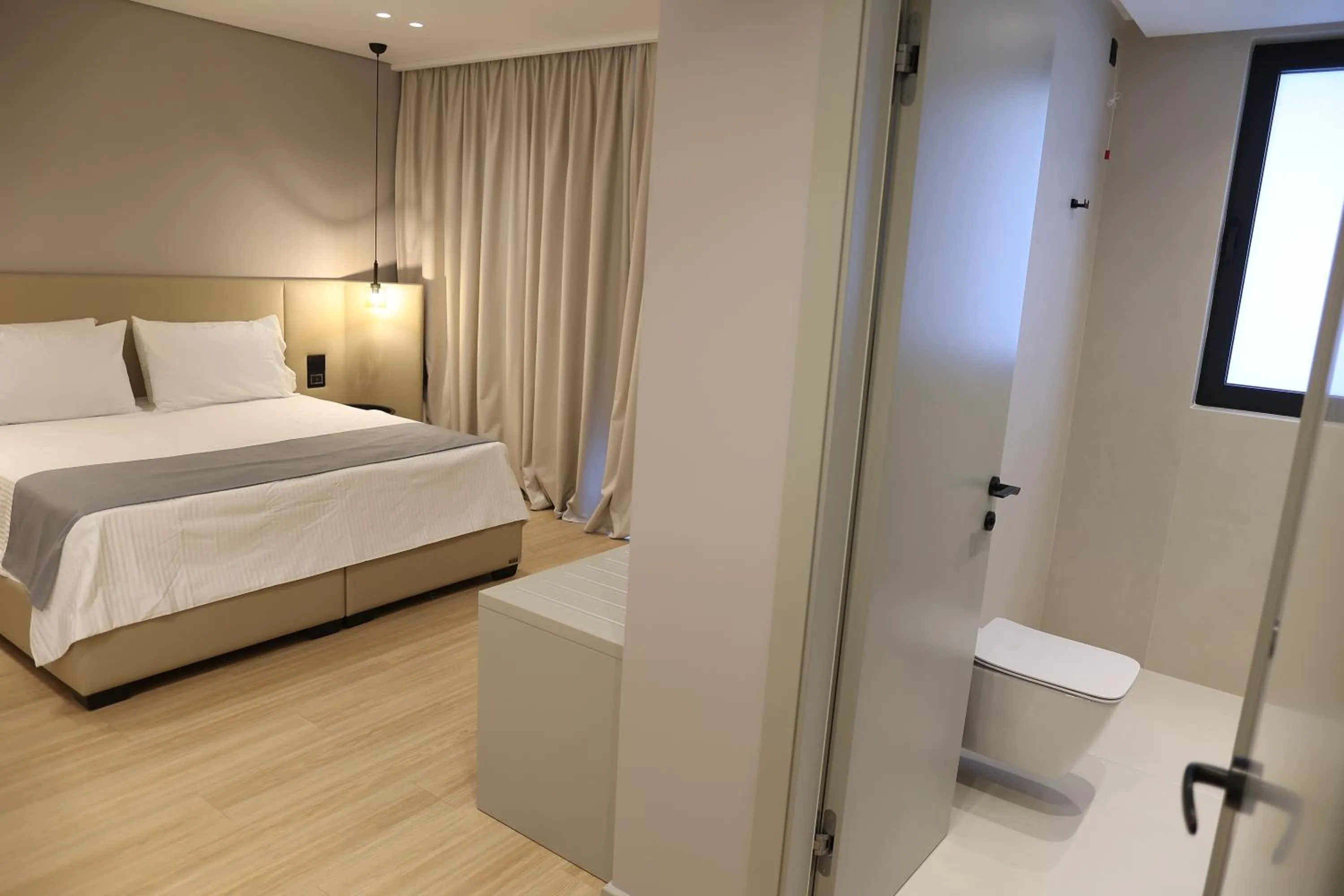 Toilet, Bed in AL'YACHT Premium Hotel