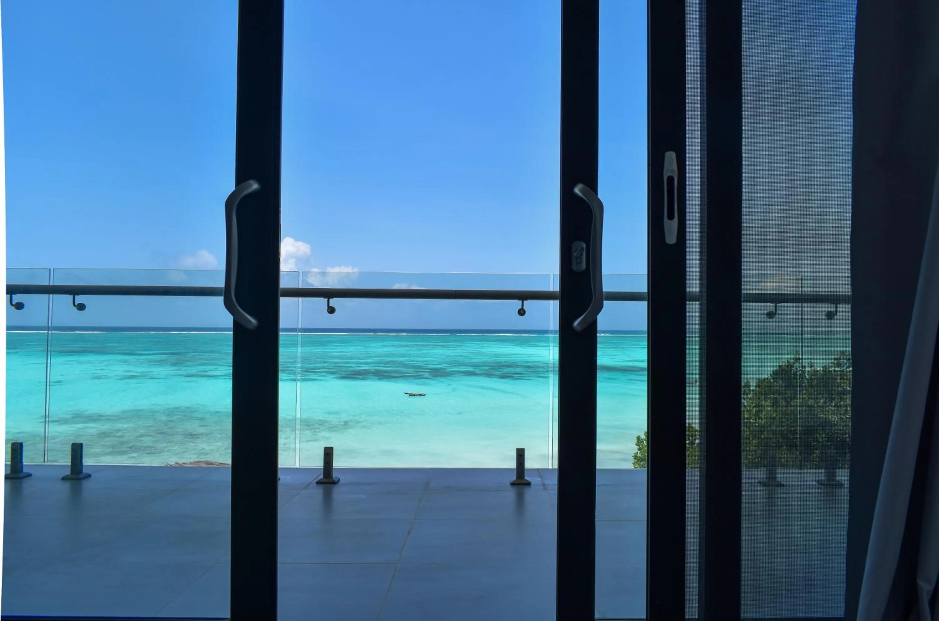 Bed in Safira Blu Luxury Resort & Villas