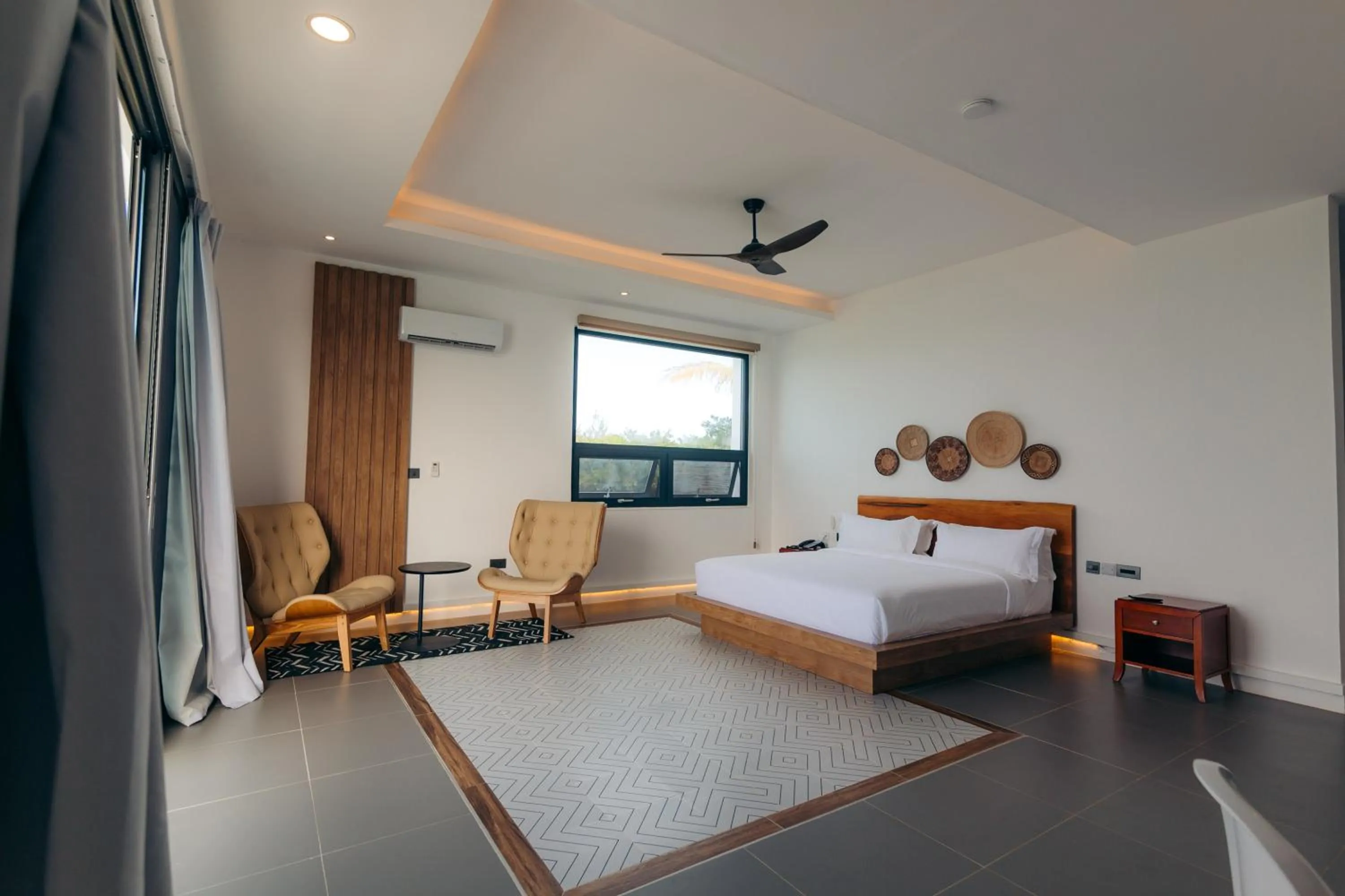 Bed in Safira Blu Luxury Resort & Villas