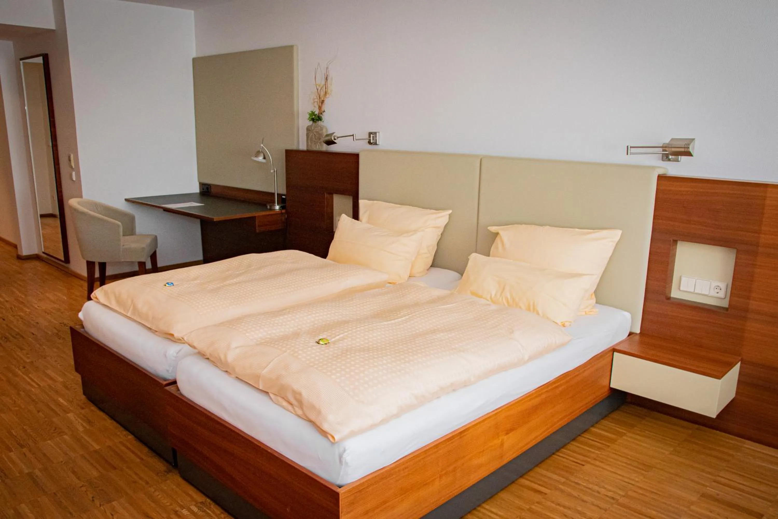 Bed in Gästehaus an der Oase