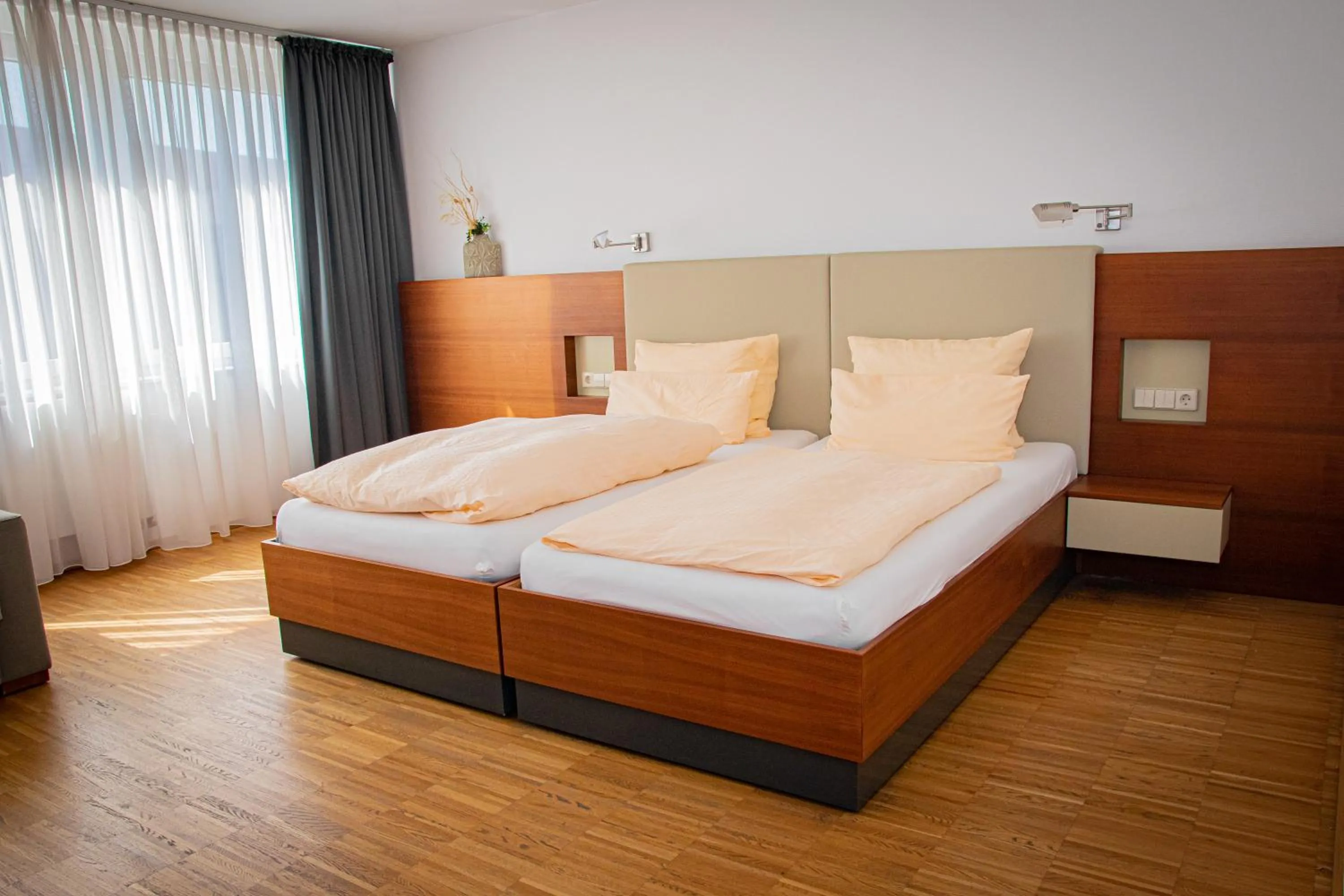 Bed in Gästehaus an der Oase