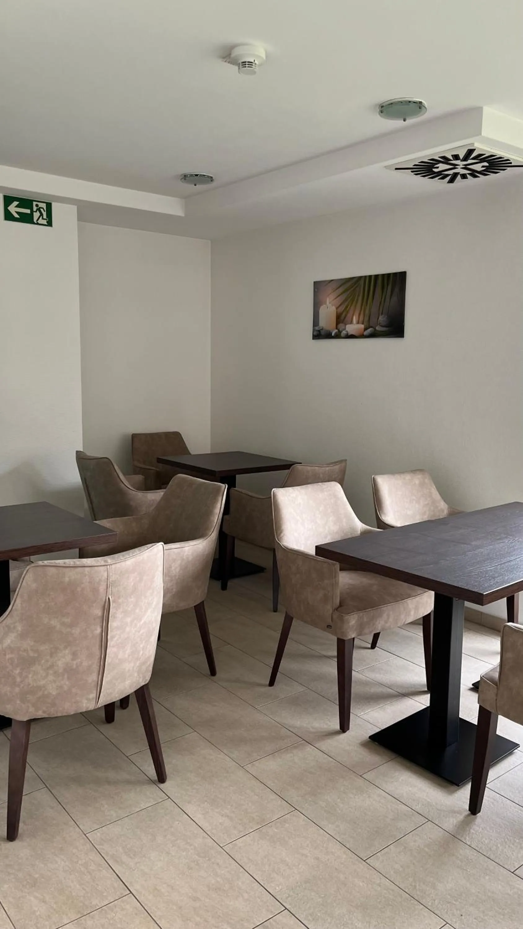 Communal lounge/ TV room in Gästehaus an der Oase