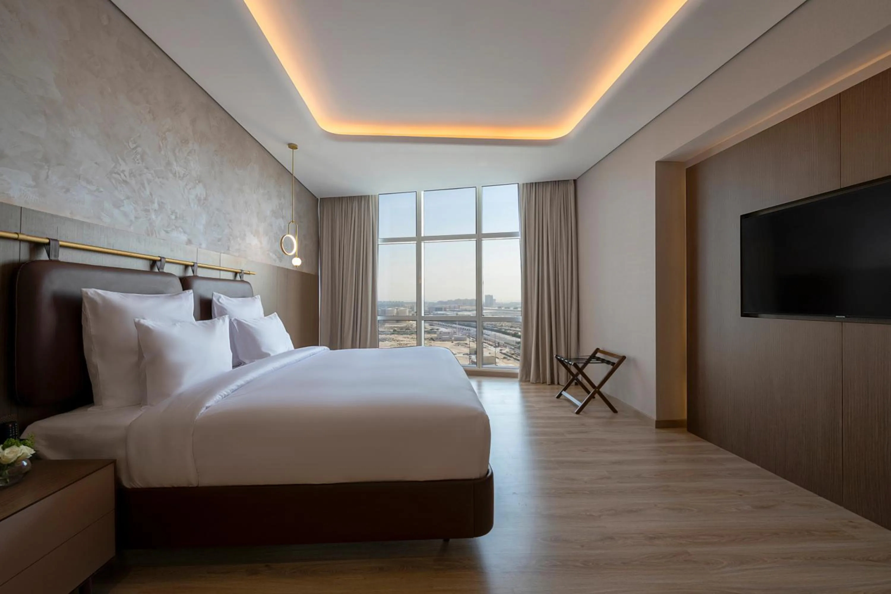 Photo of the whole room, Bed in Movenpick Jumeirah Village Triangle