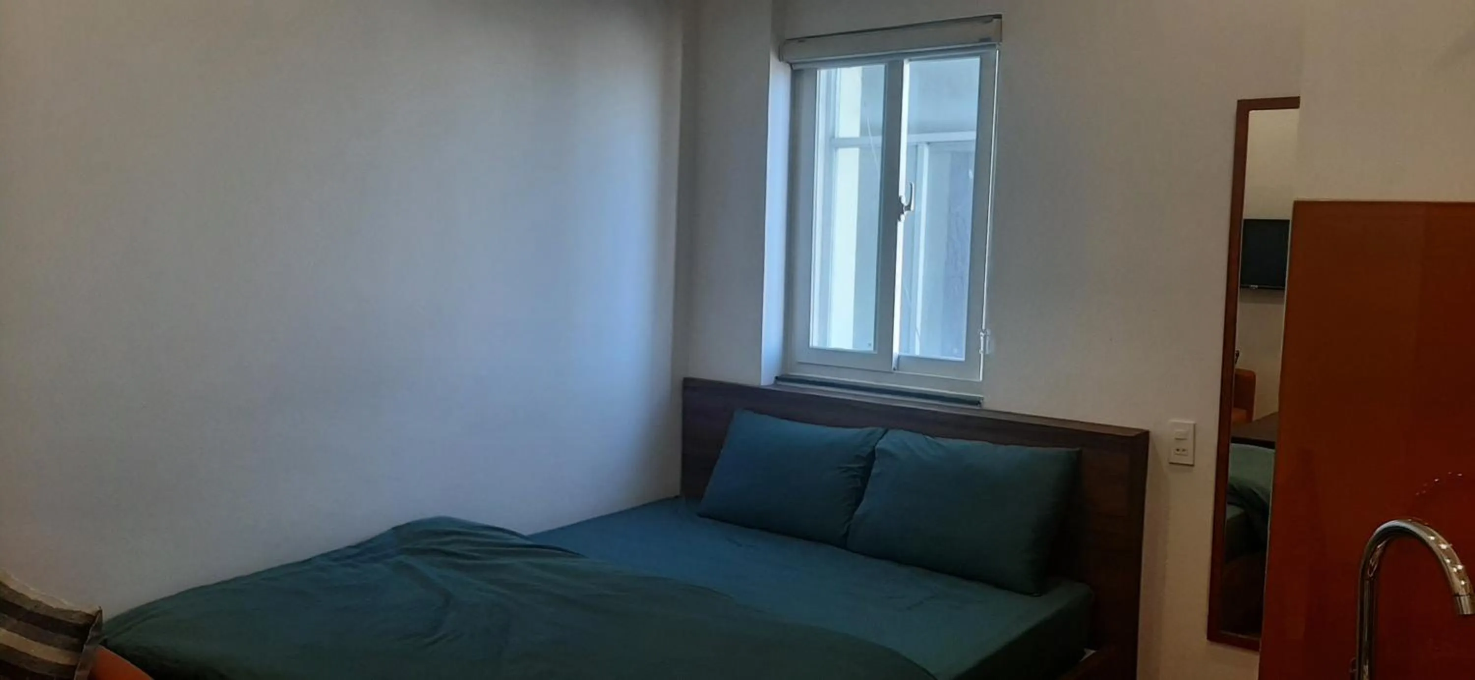 Bedroom, Bed in OYO 1161 Puchin Hotel And Apartment