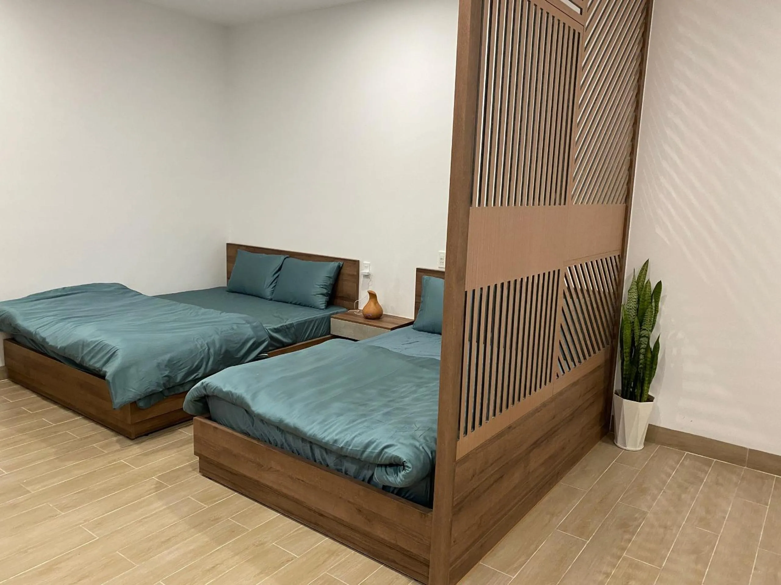 Bedroom, Bed in OYO 1161 Puchin Hotel And Apartment