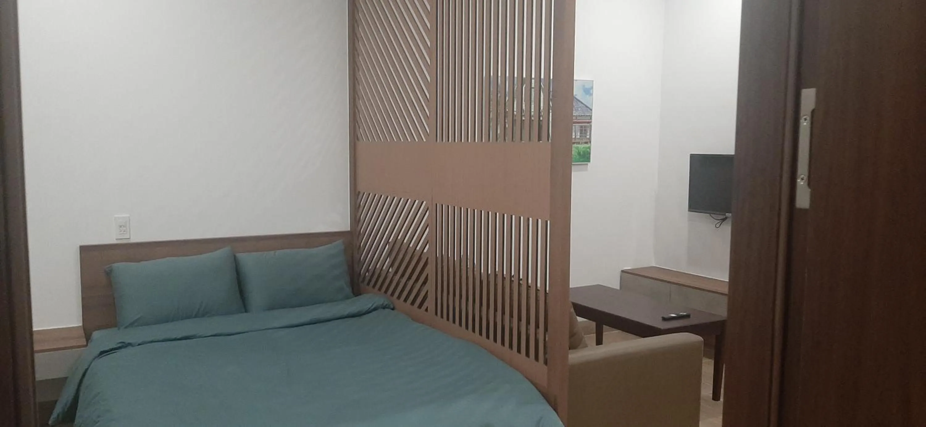 Bedroom, Bed in OYO 1161 Puchin Hotel And Apartment