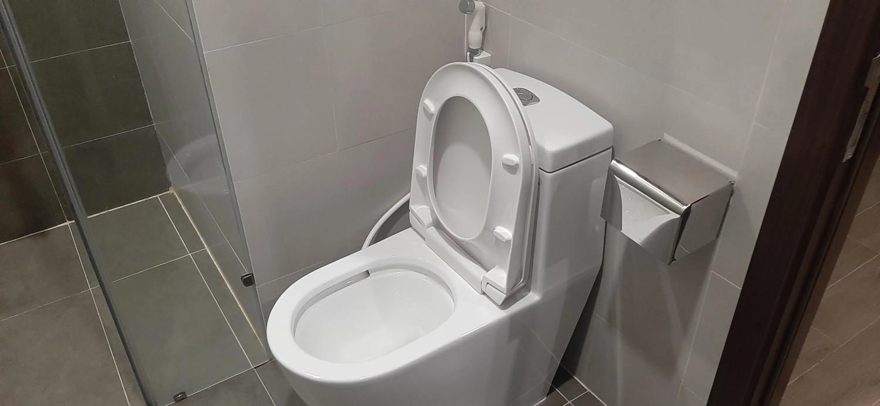 Bathroom in OYO 1161 Puchin Hotel And Apartment