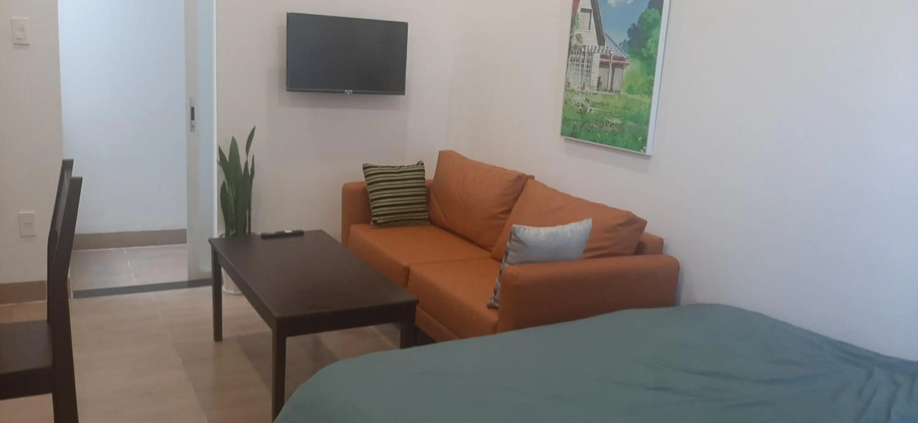 Bedroom, Bed in OYO 1161 Puchin Hotel And Apartment