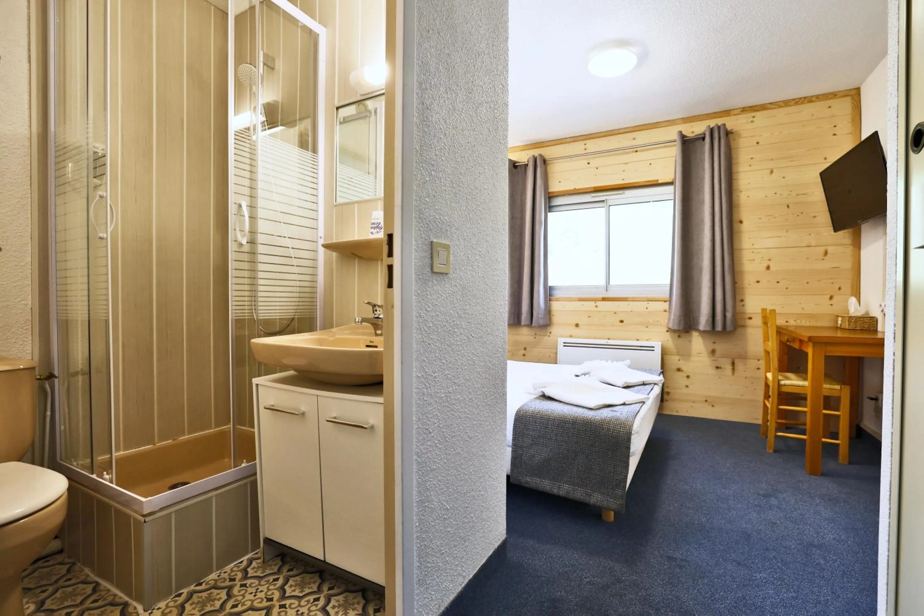 Bed in Le Balcon des Ecrins