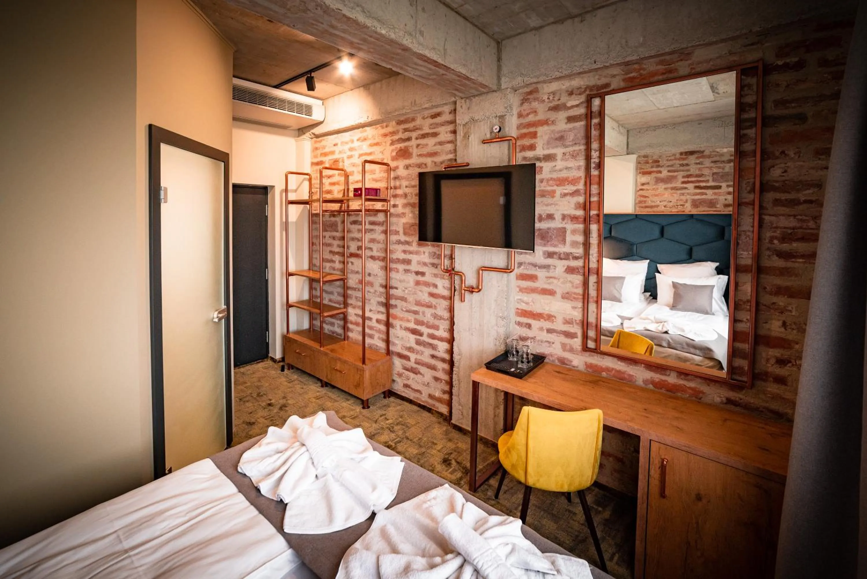 Bed in Mustang Boutique Rooms