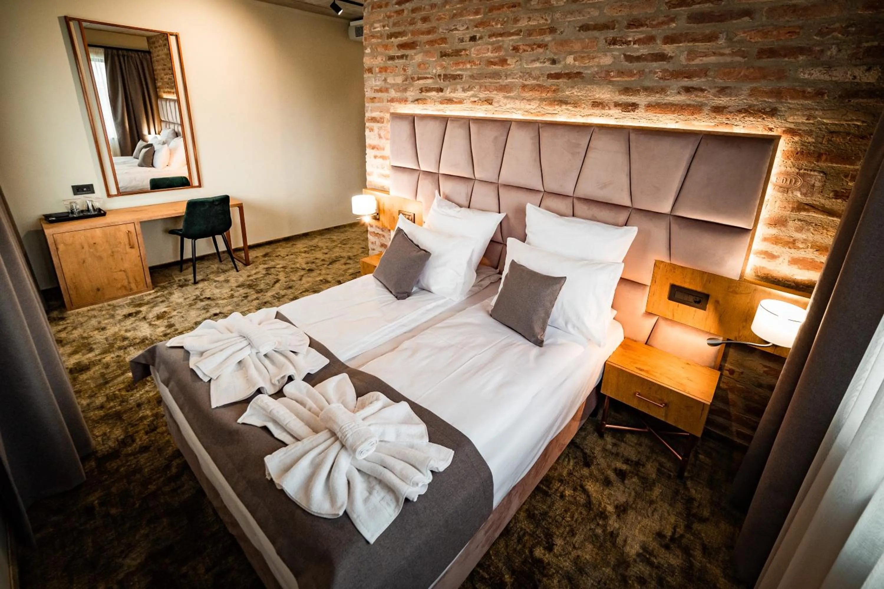 Bed in Mustang Boutique Rooms