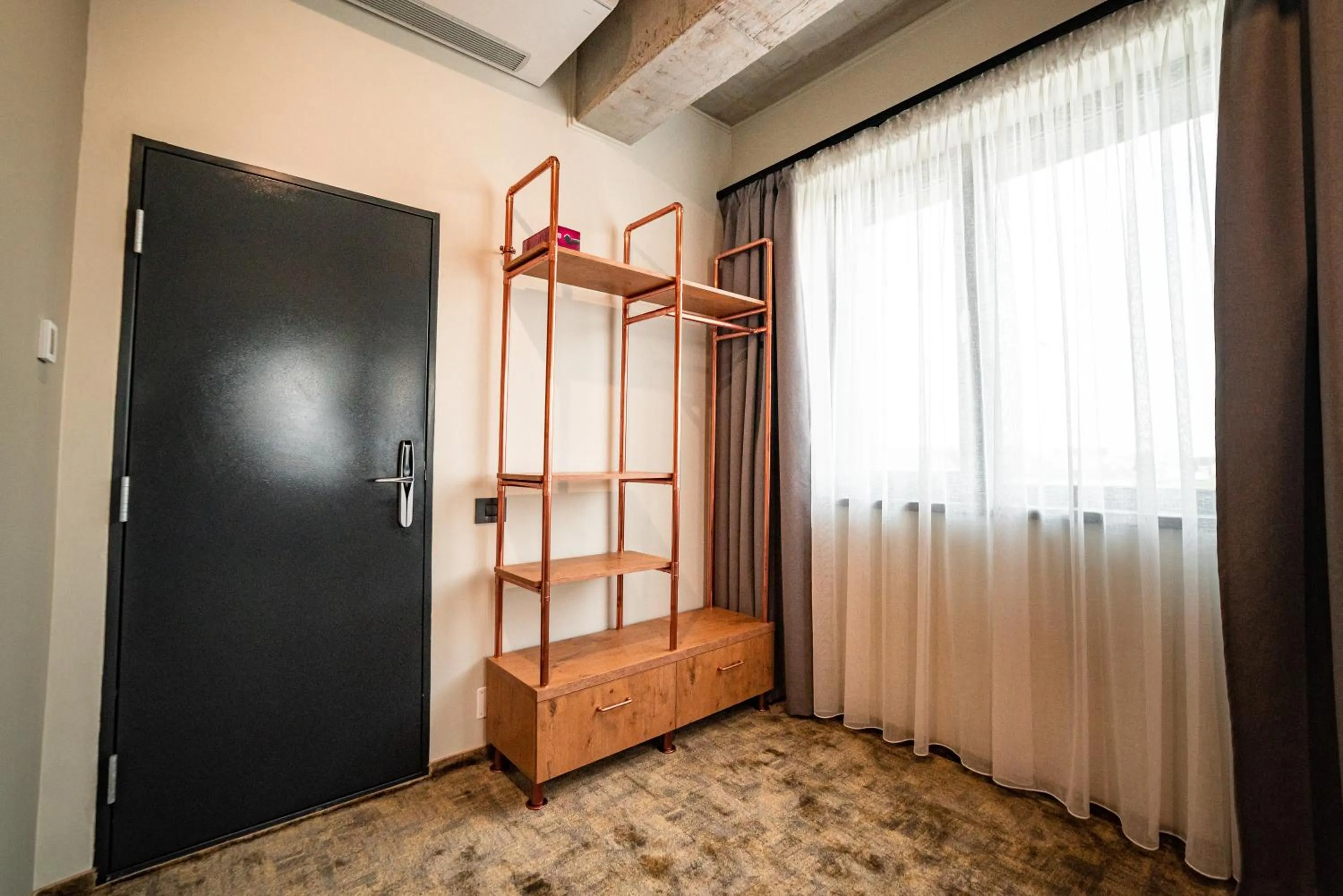 Bed in Mustang Boutique Rooms