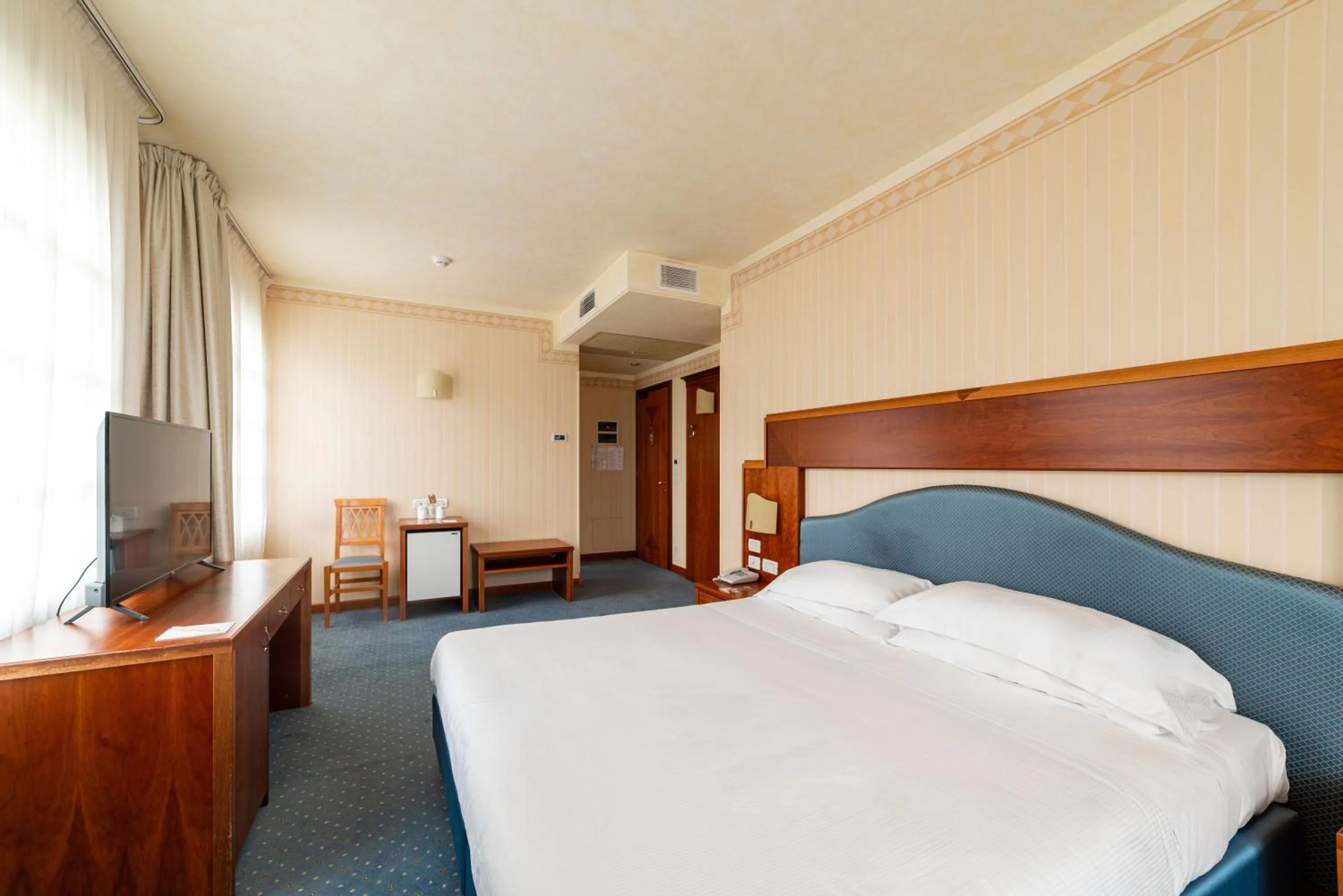 Bed in Phi Hotel Astoria