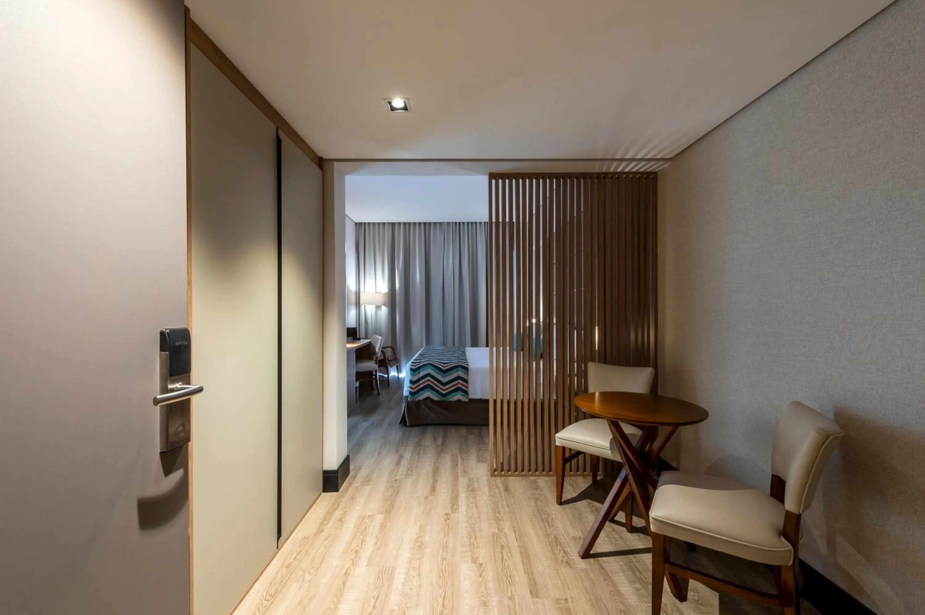 Bed in Japy Golf Resort Hotel