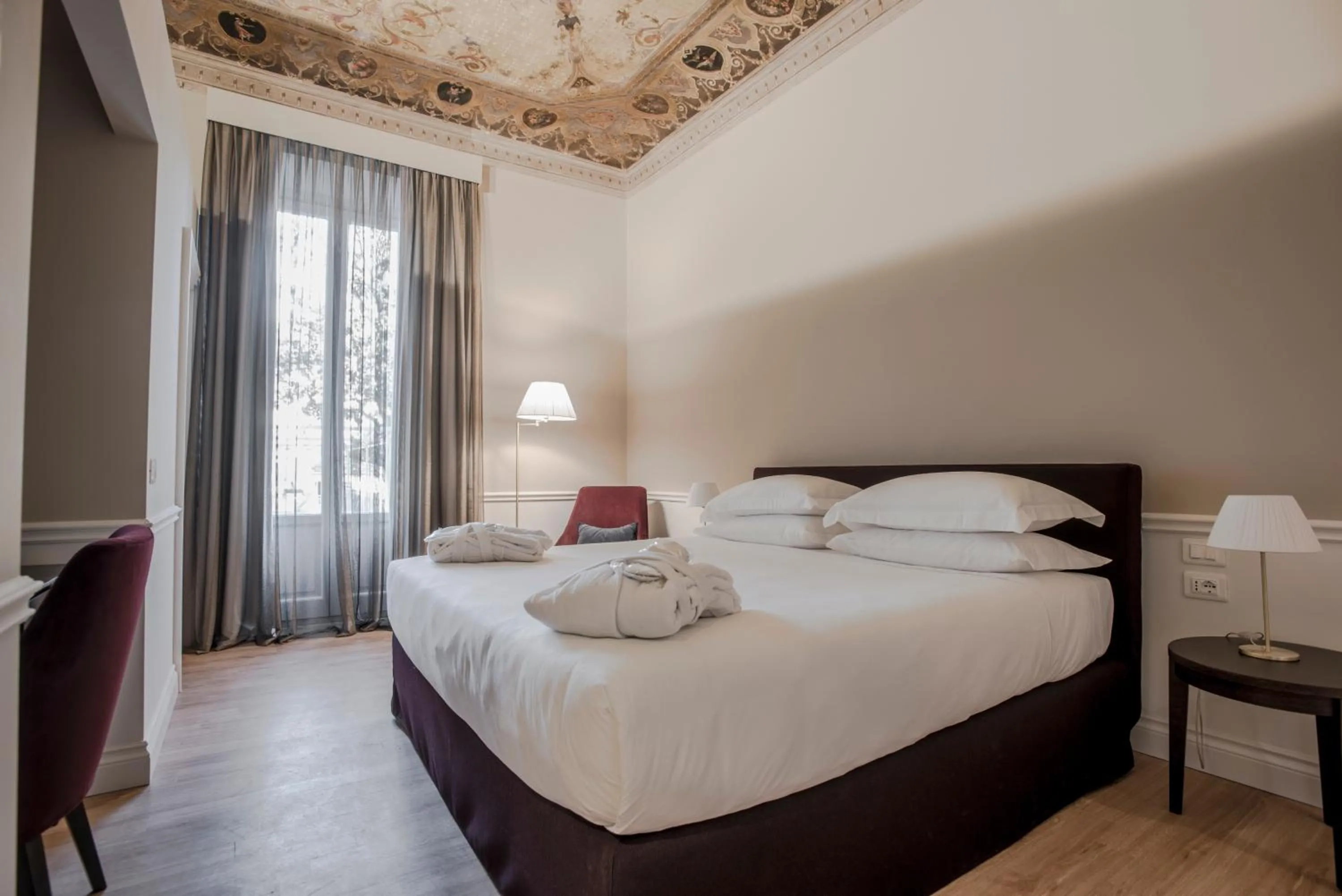 Bed in Palazzo Castri 1874 Spa & Garden