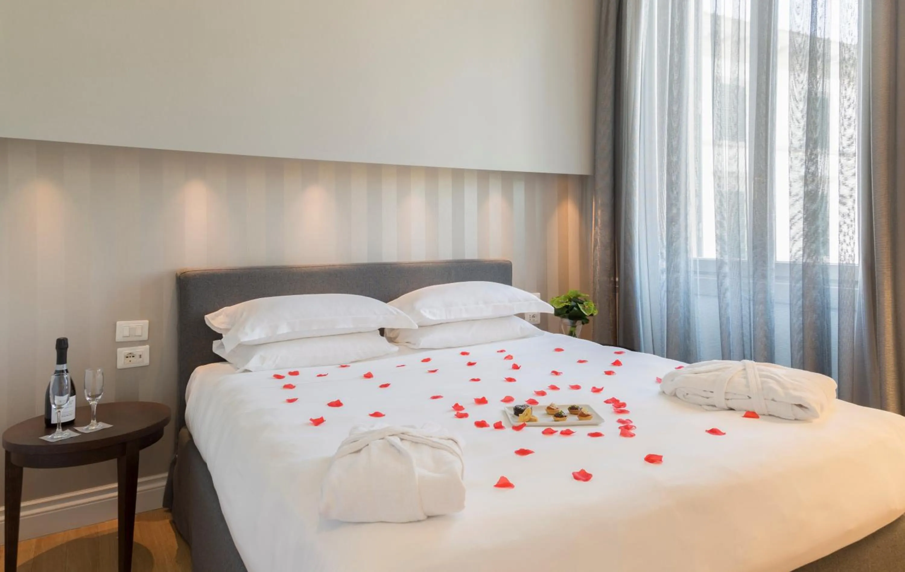 Bed in Palazzo Castri 1874 Spa & Garden