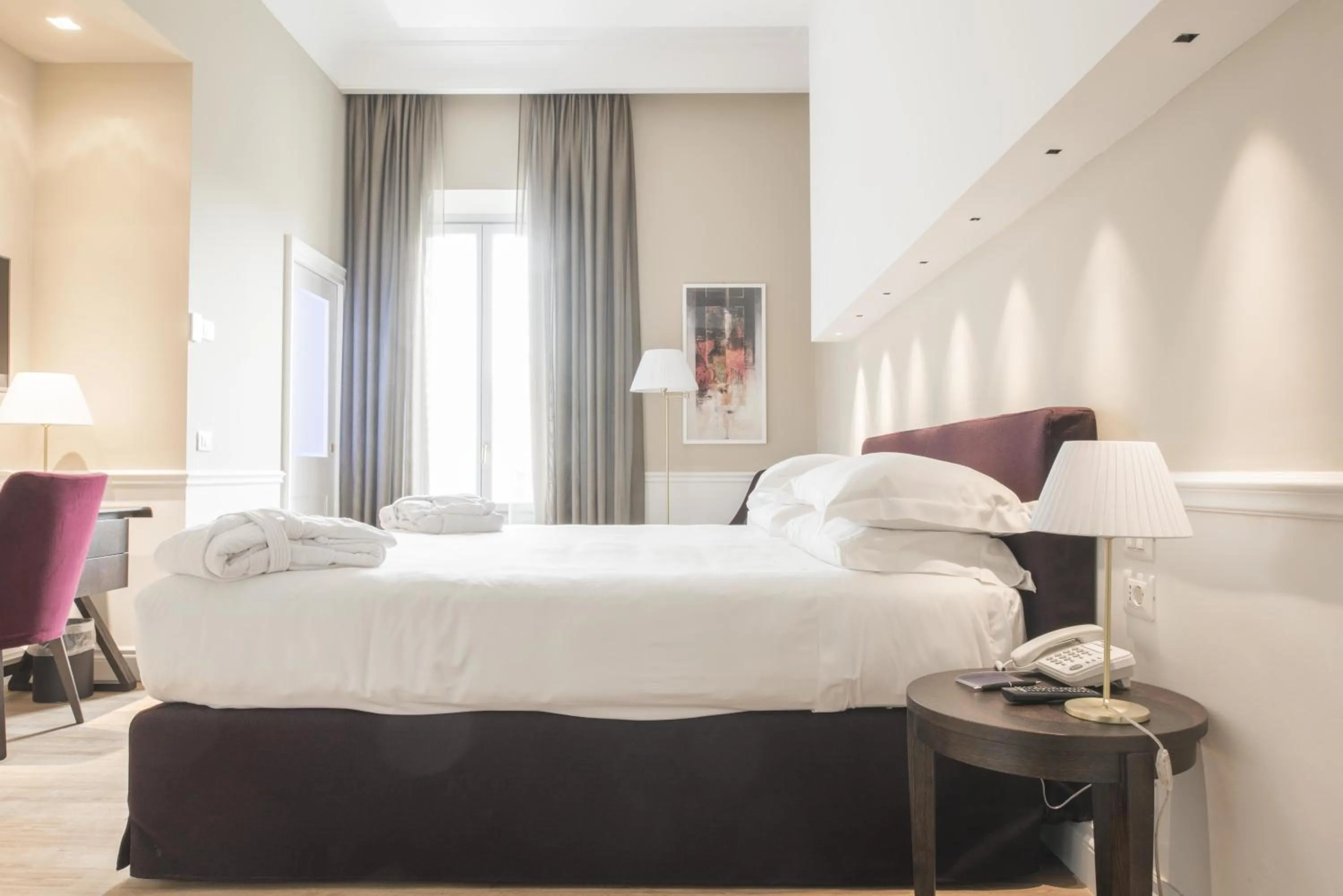 Bed in Palazzo Castri 1874 Spa & Garden