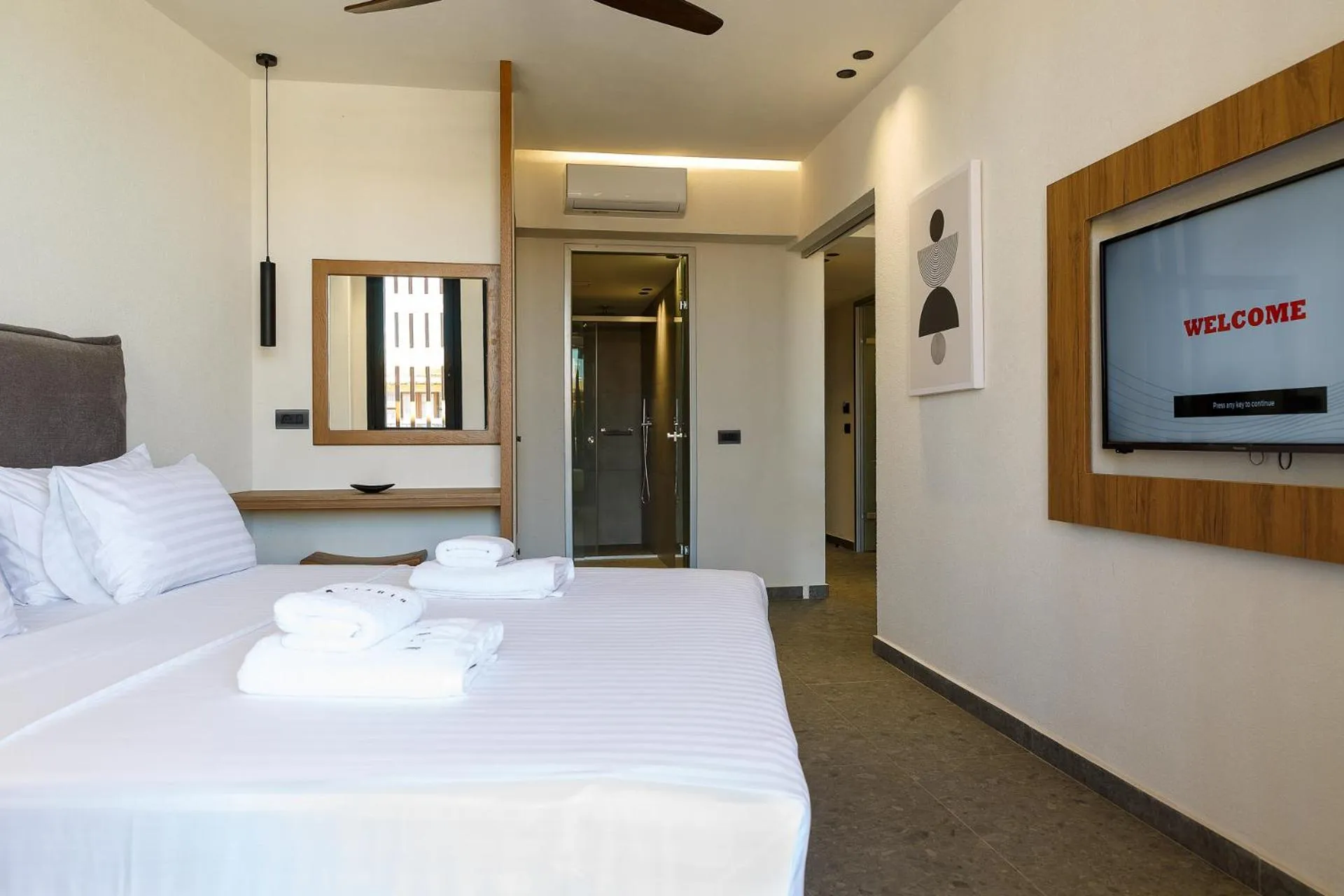 Bed in Utopia Luxury Suites