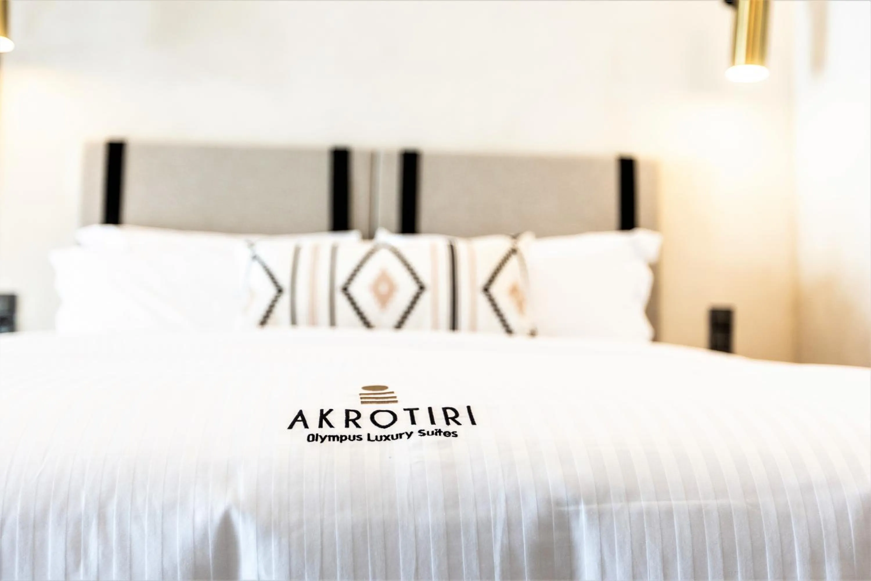 Bed in Akrotiri Olympus Luxury Suites - Adults Only