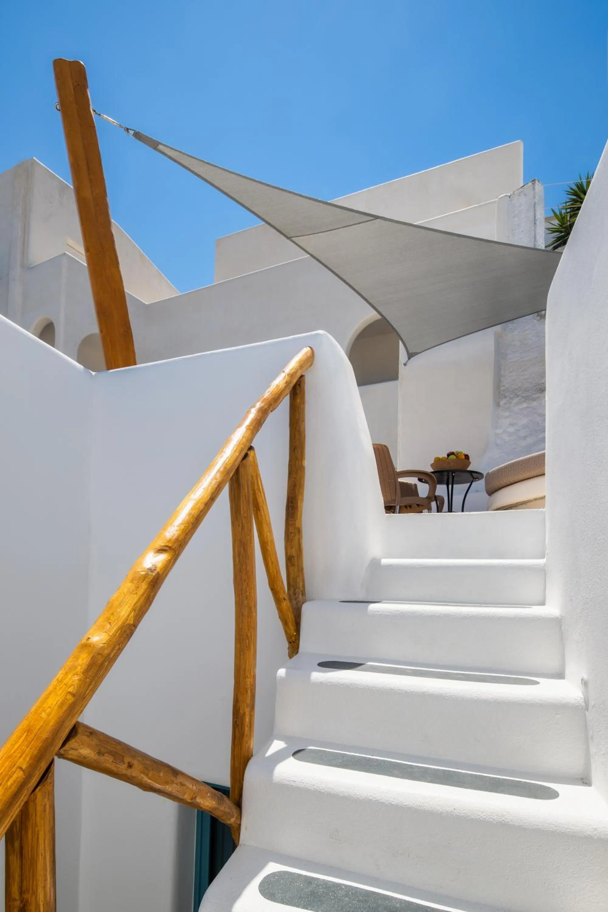 Balcony/Terrace in I K I A Since 1980 by Calm Collection