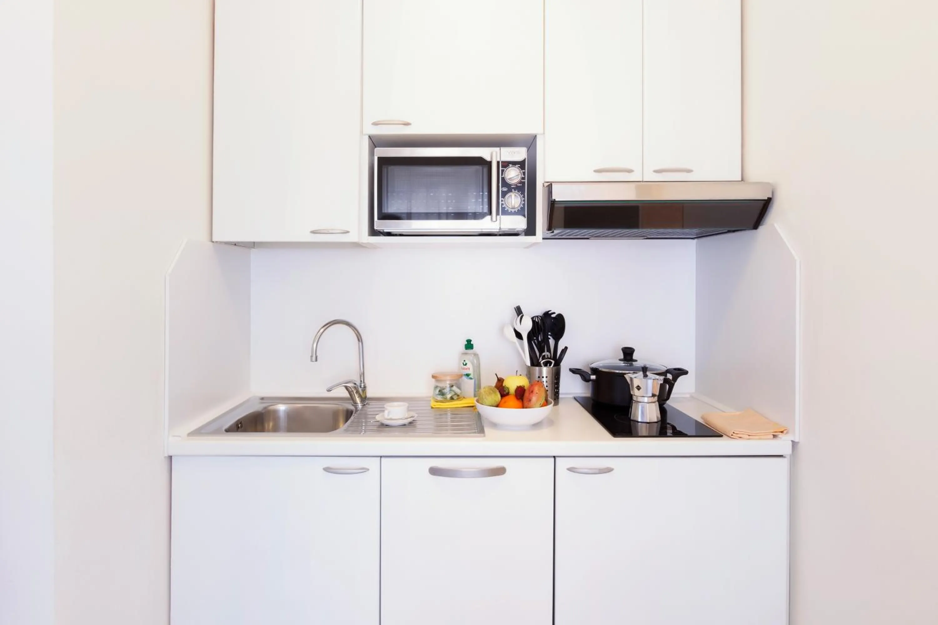 Kitchen or kitchenette in Aparthotel Adagio Rome Vatican