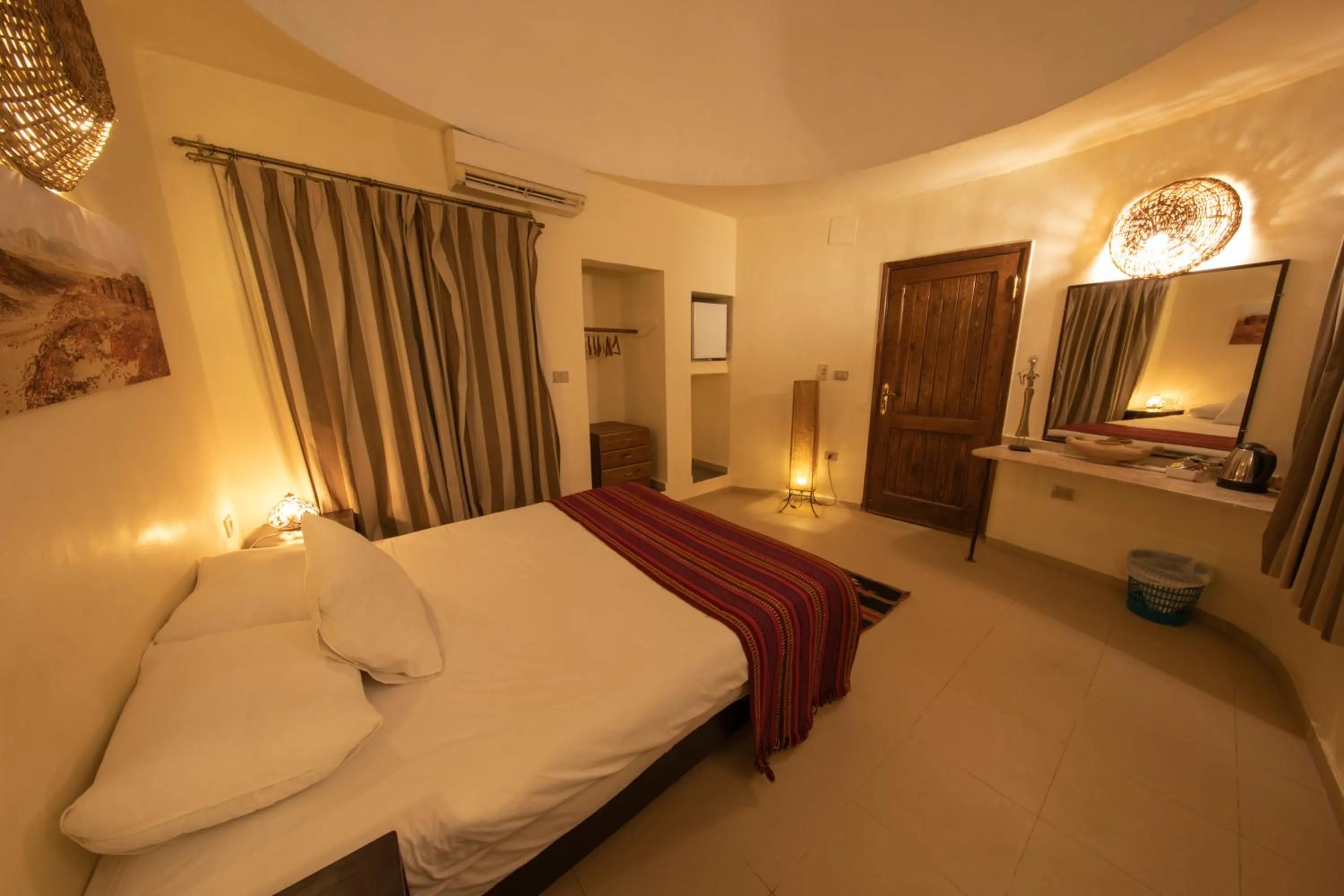 Photo of the whole room, Bed in The Bedouin Moon