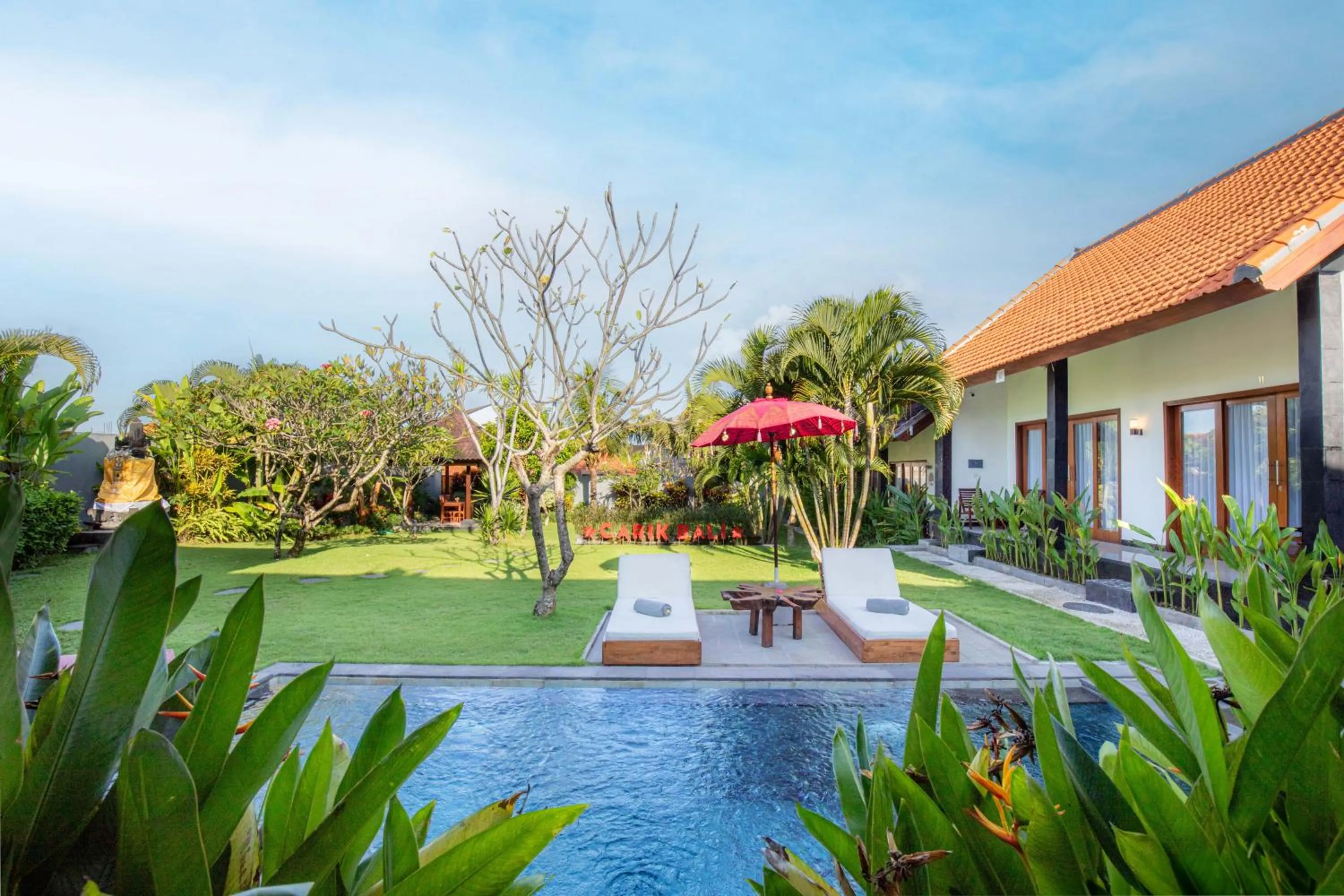 Swimming pool in Carik Bali Guest House Canggu