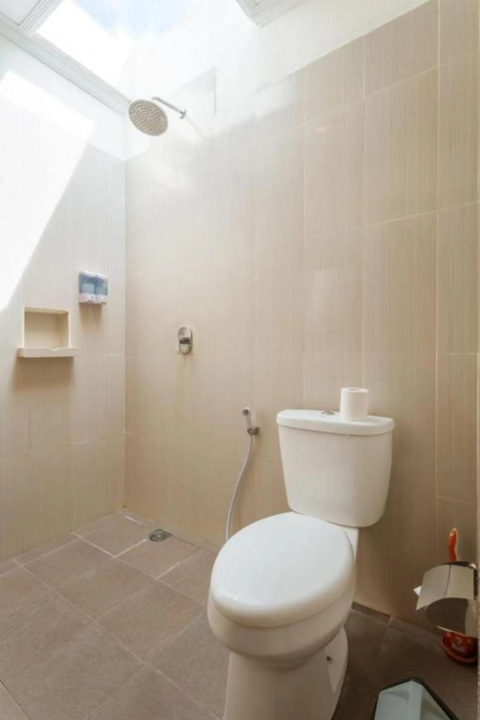 Shower in Carik Bali Guest House Canggu