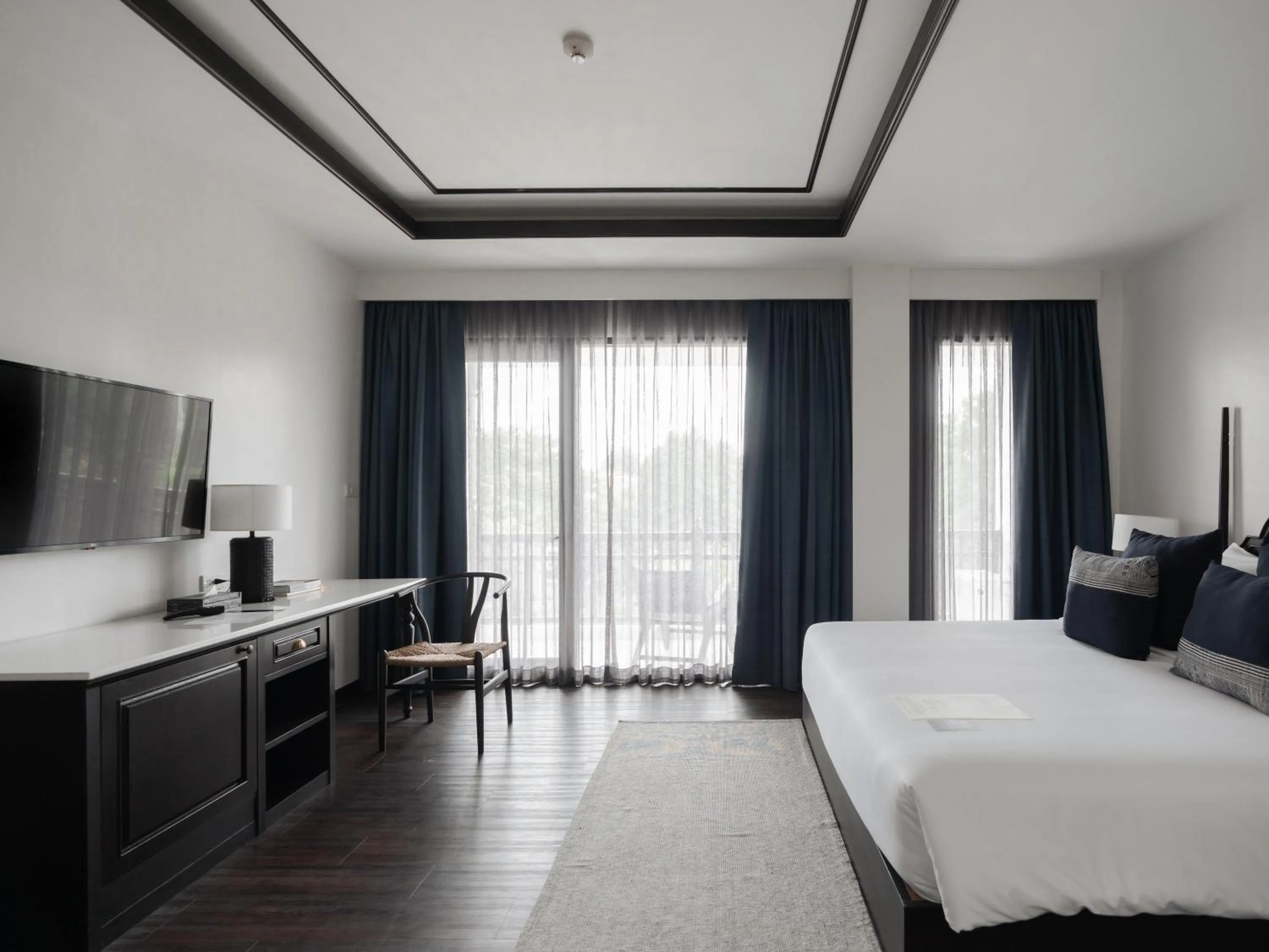 Photo of the whole room, Bed in Burirattana Hotel-An Adults Only Hotel