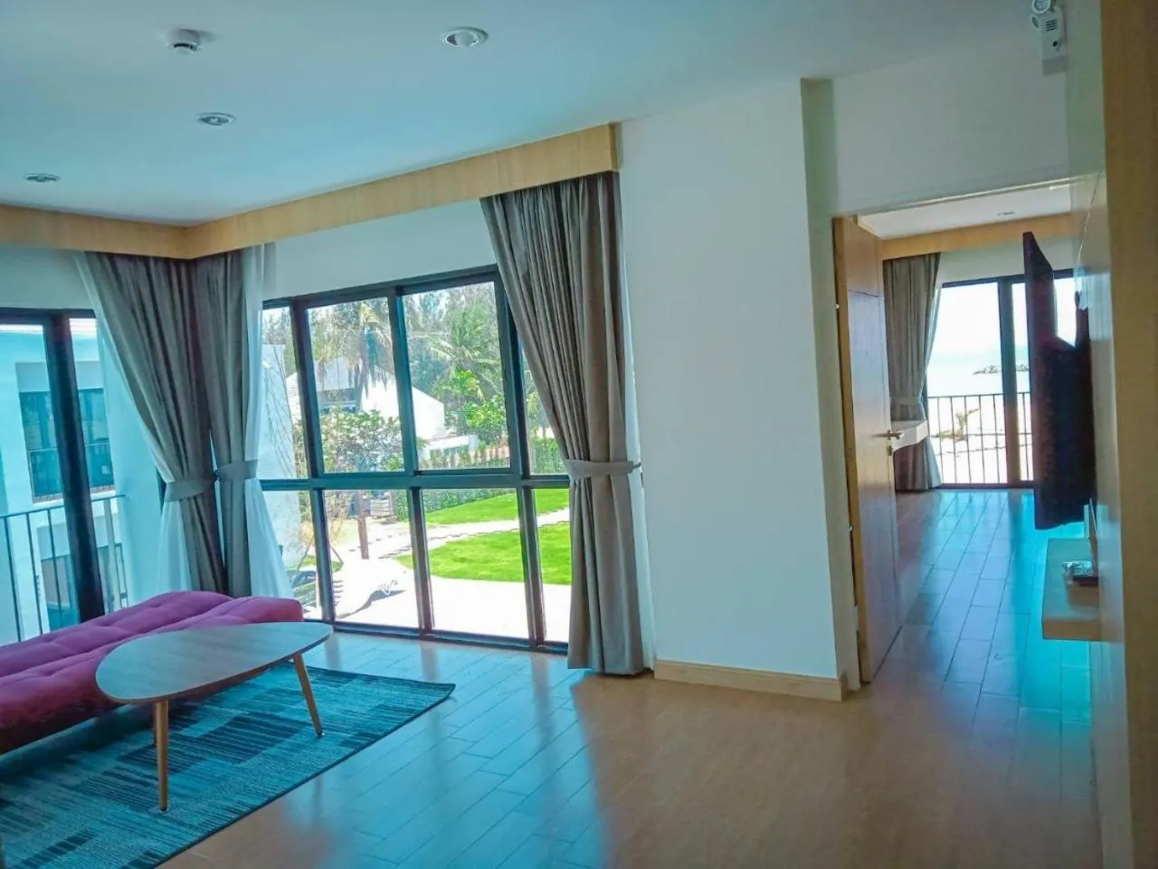 Living room, Bed in HATCHAO HERITAGE BEACH FRONT RESORT