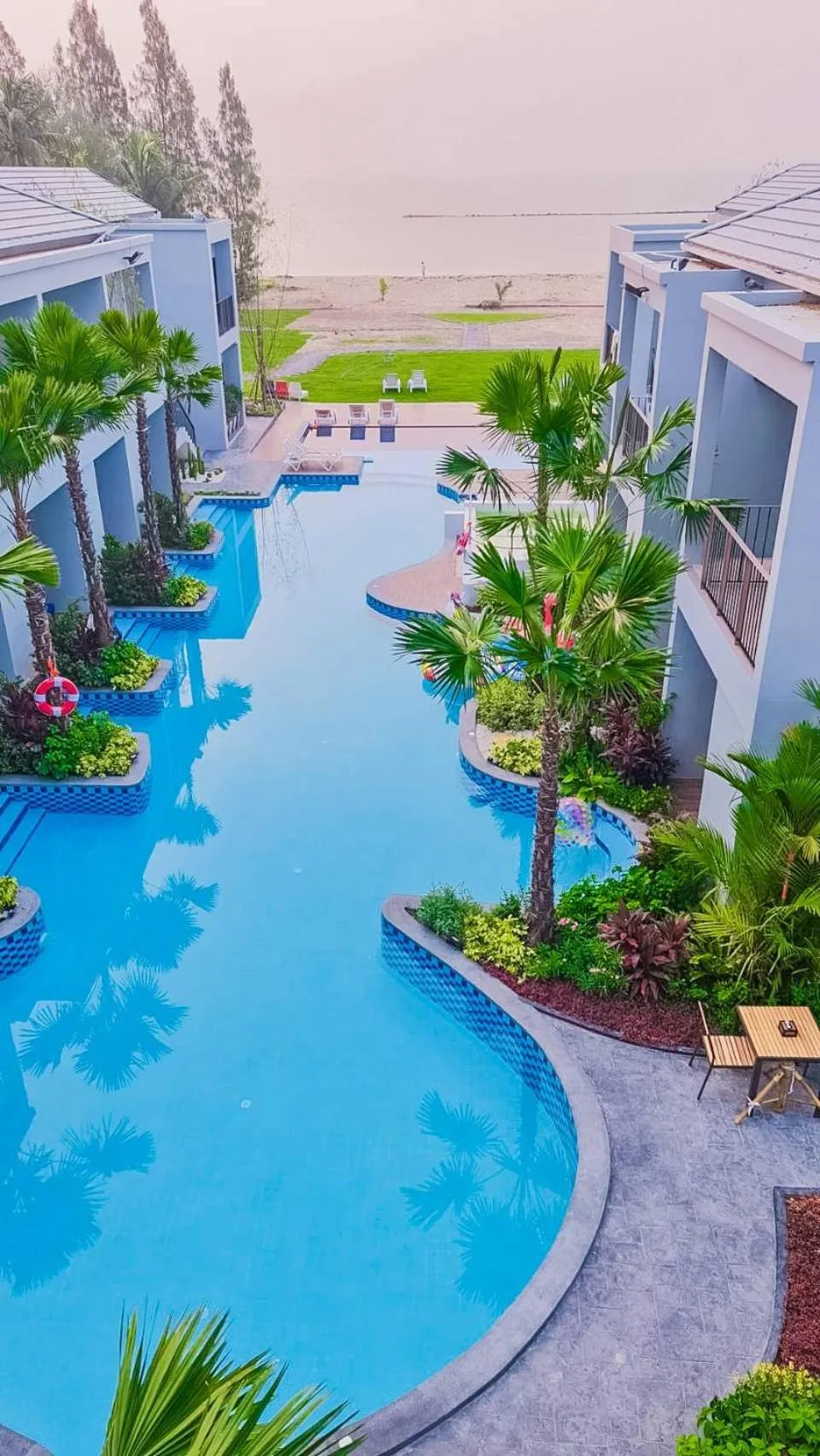 Swimming pool in HATCHAO HERITAGE BEACH FRONT RESORT