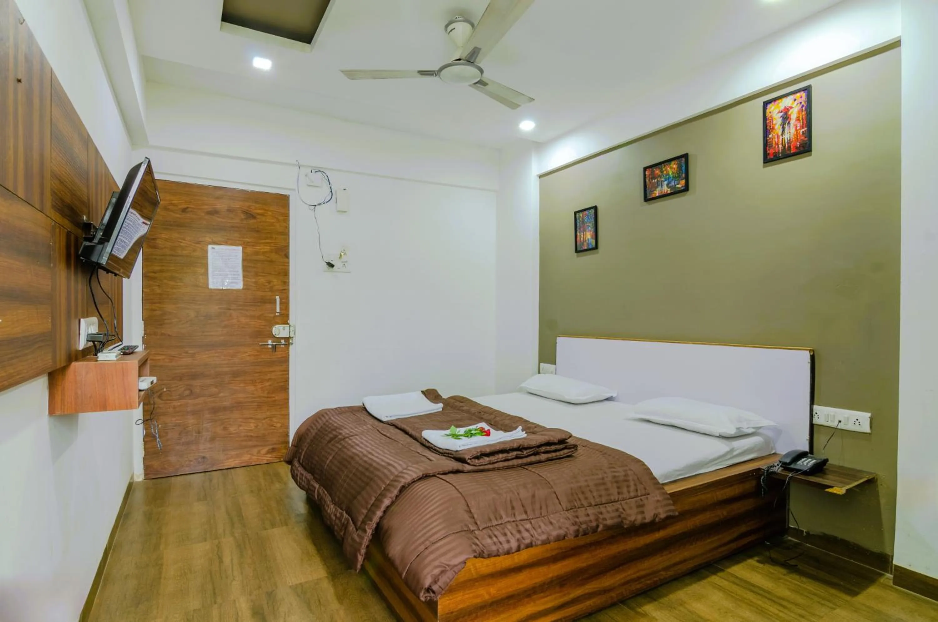 Photo of the whole room, Bed in White House Beach Resort, Nagaon