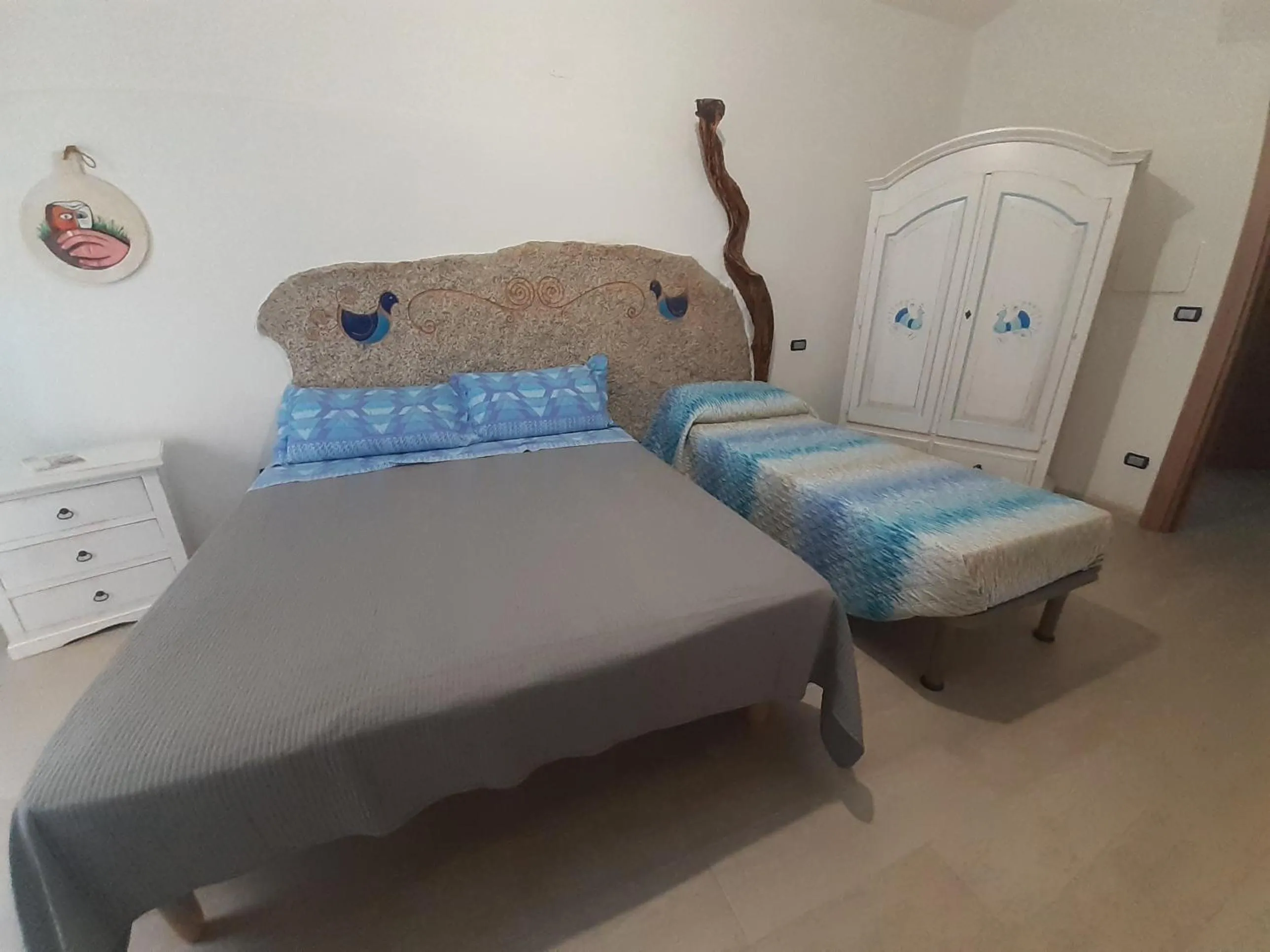 Bed in bed and breakfast Murales Orgosolo