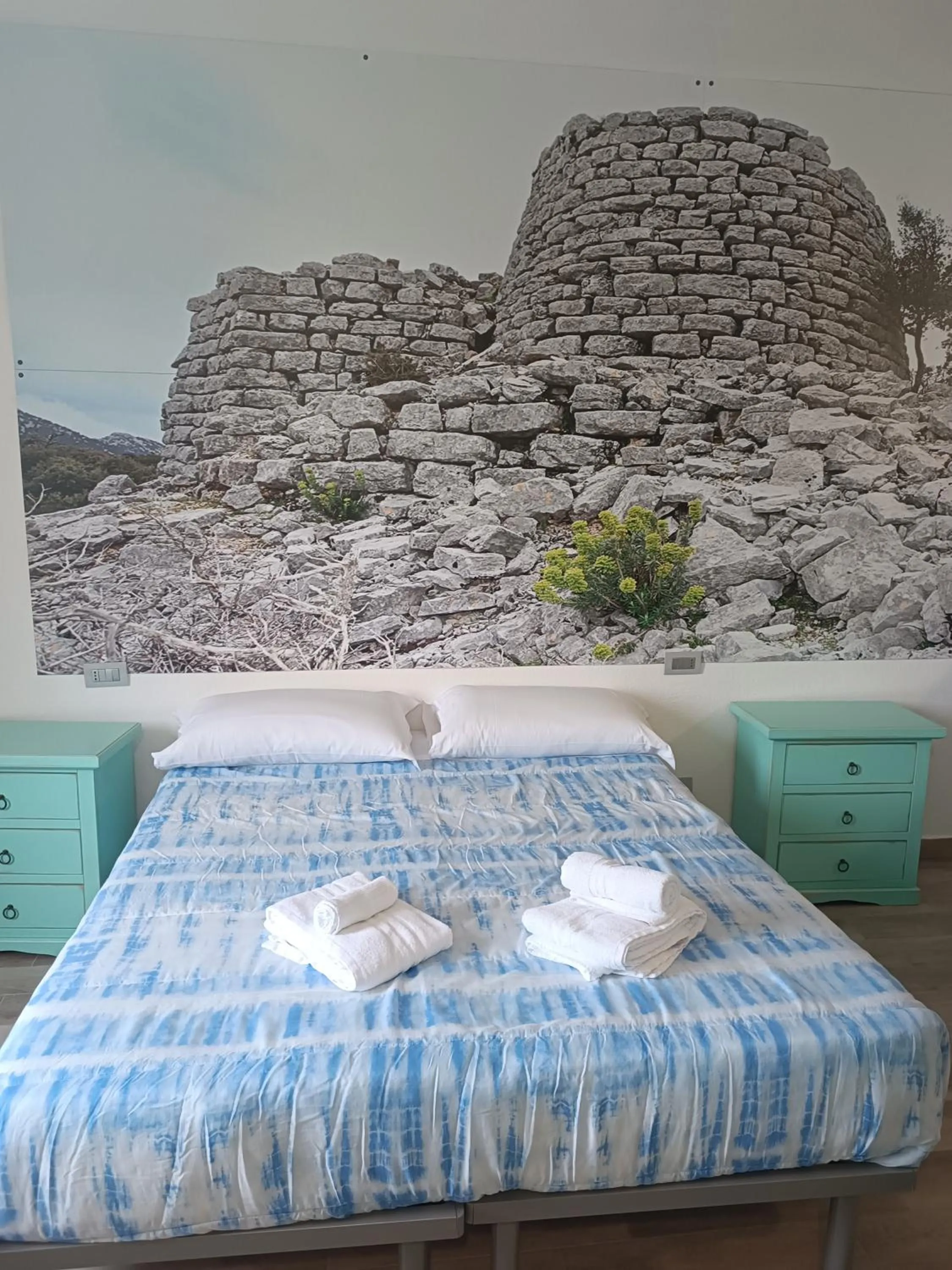 Bed in bed and breakfast Murales Orgosolo