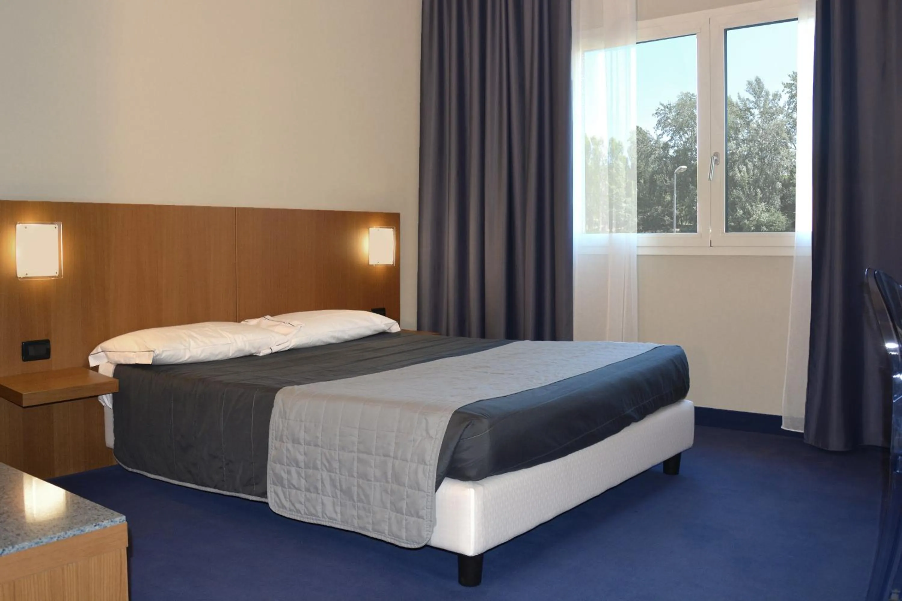 Bed in Anusca Palace Hotel