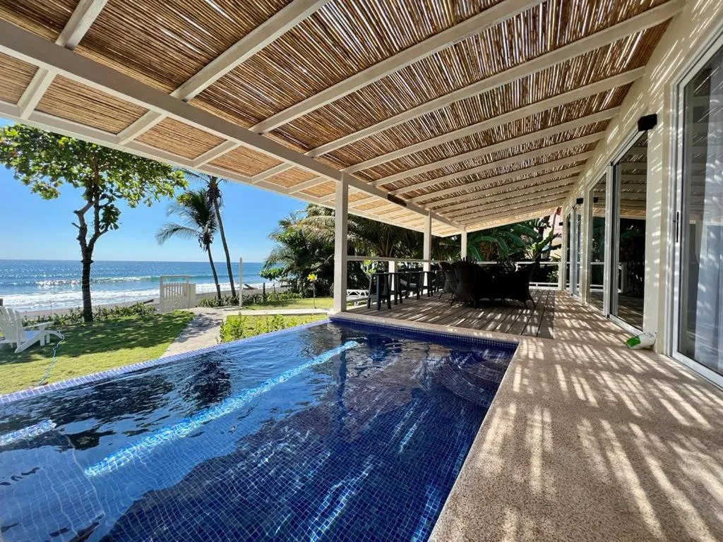 Swimming pool in The Backyard Beach House