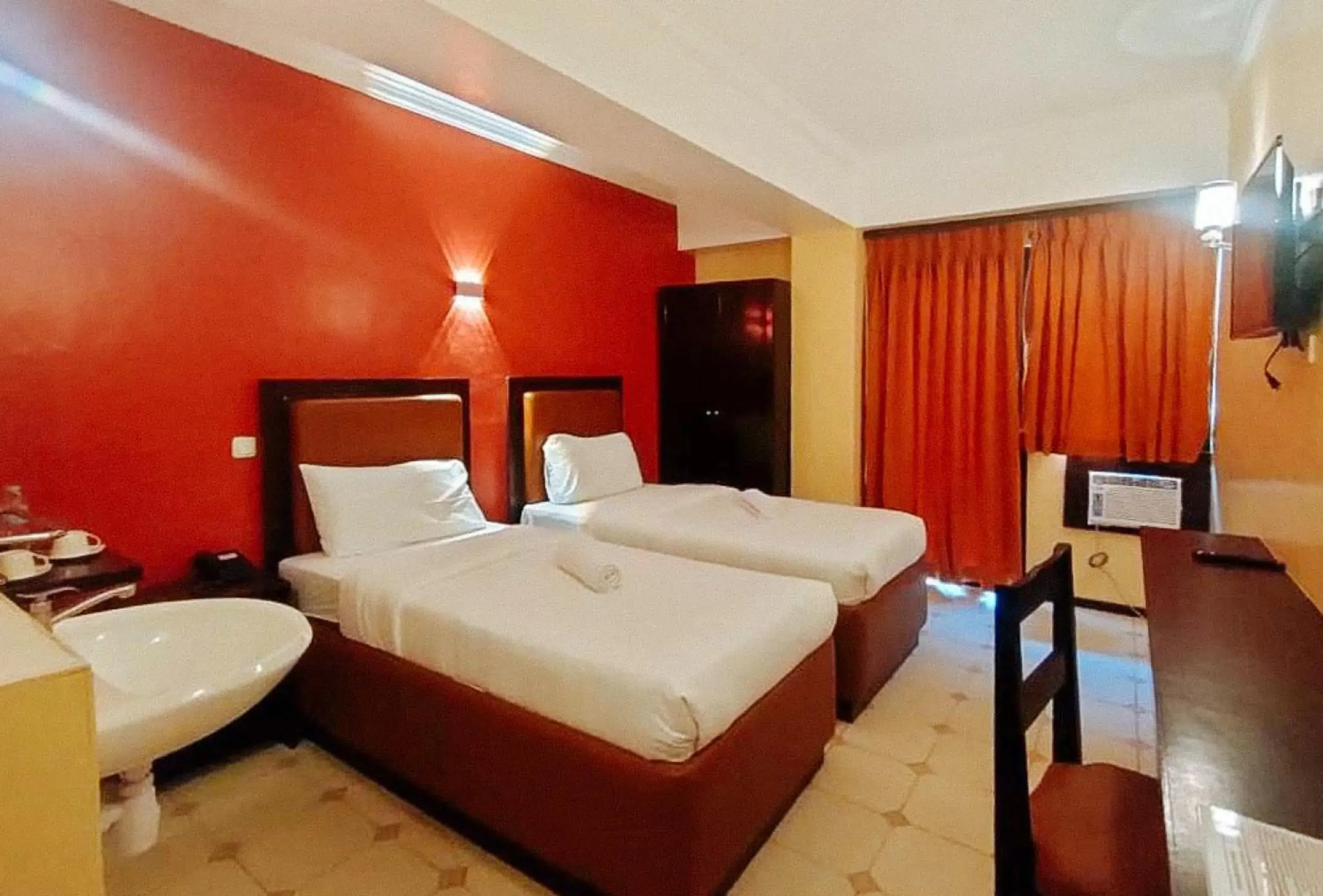 Deluxe Twin Room in RedDoorz at Carlton-Martin Hotel Masbate City Deluxe Twin Room in RedDoorz at Carlton-Martin Hotel Masbate City
