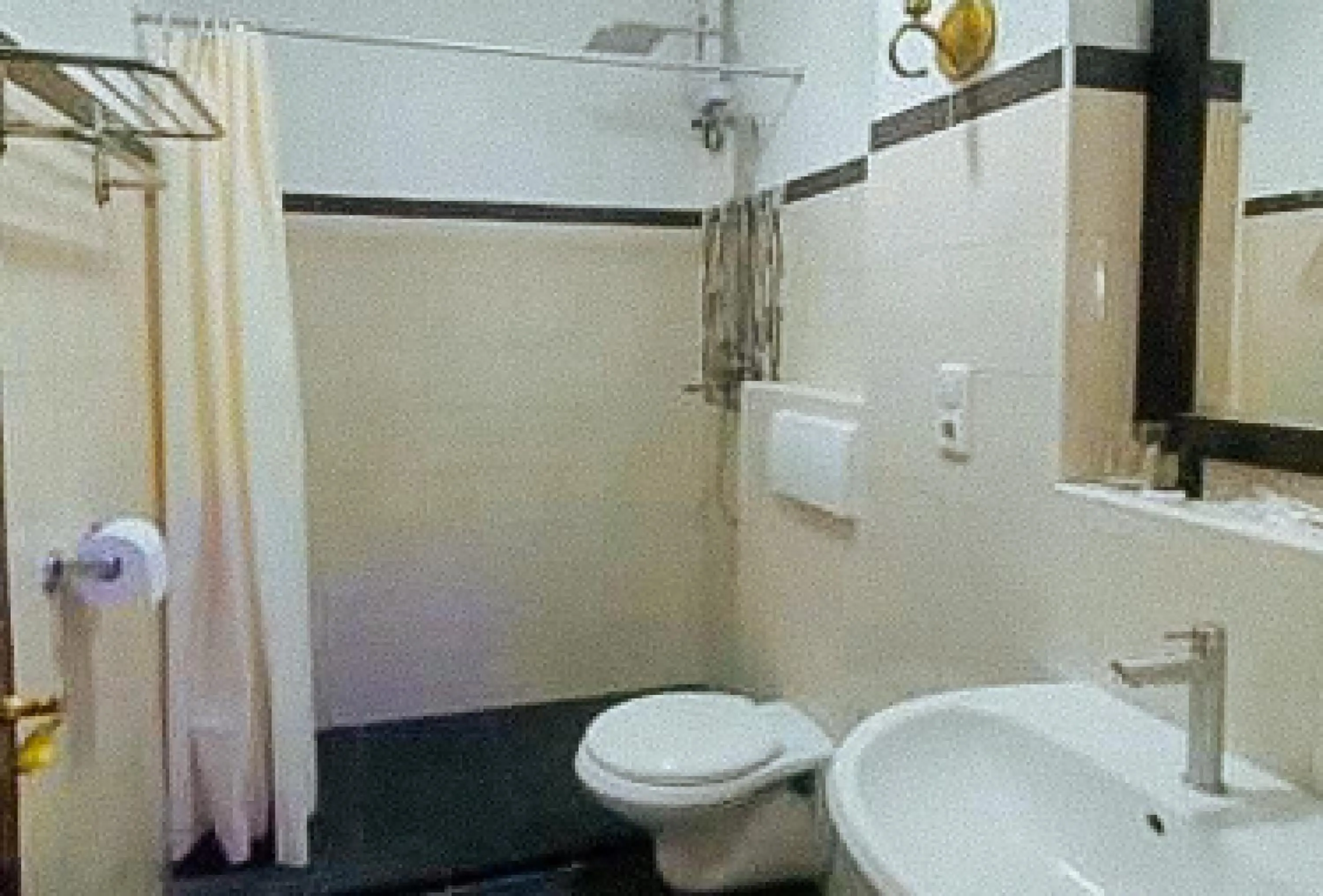 Bathroom in RedDoorz at Carlton-Martin Hotel Masbate City