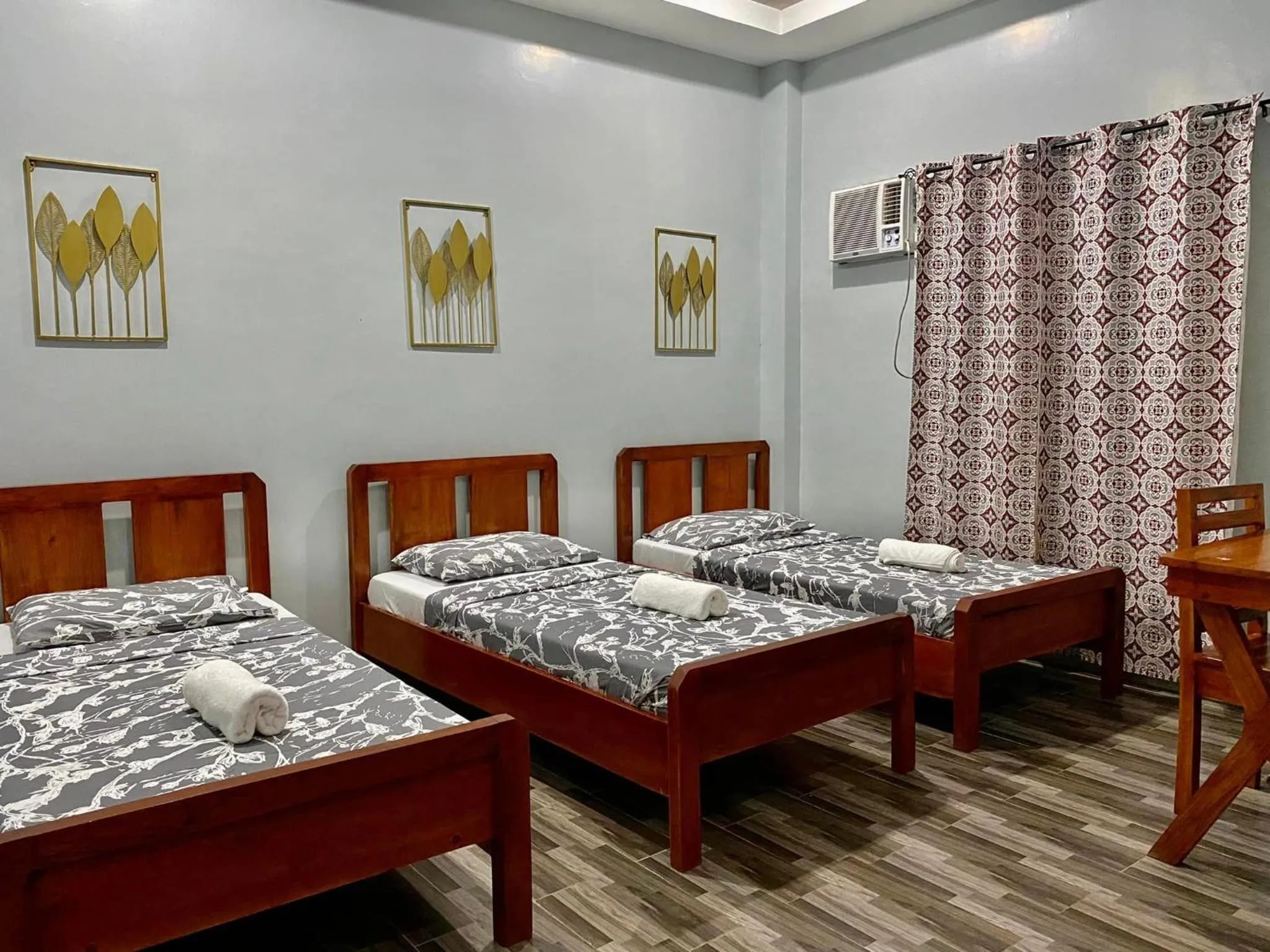 Bed in RedDoorz at Gracia's Calzada Inn Camiguin