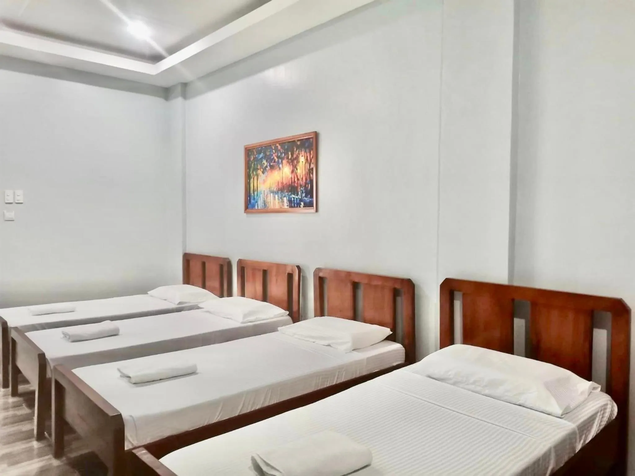 Bed in RedDoorz at Gracia's Calzada Inn Camiguin