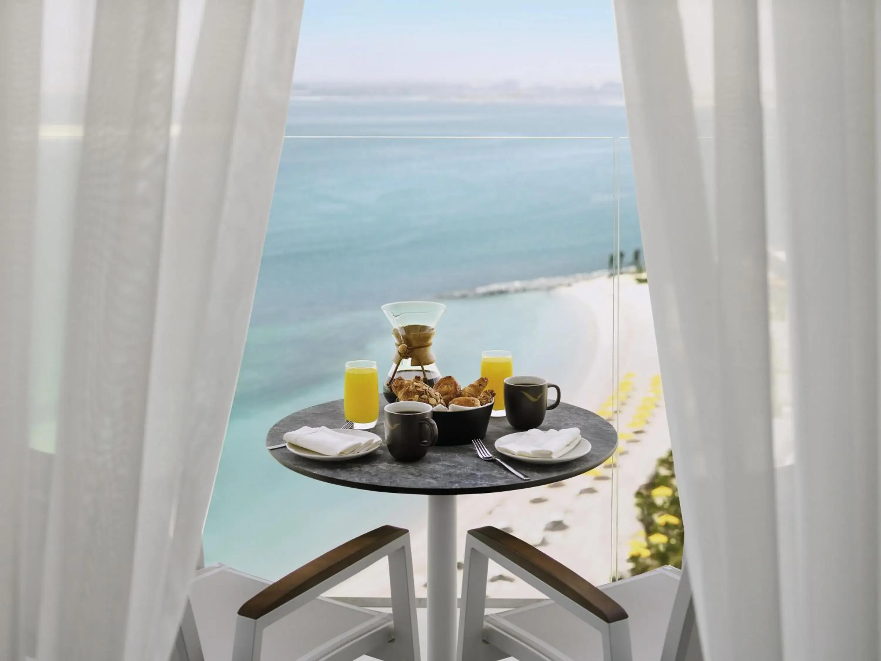 Premium King Room with Beach and Pool in Mövenpick Resort Al Marjan Island Premium King Room with Beach and Pool in Mövenpick Resort Al Marjan Island