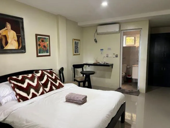 Bed in Casa Cecilia Hotel